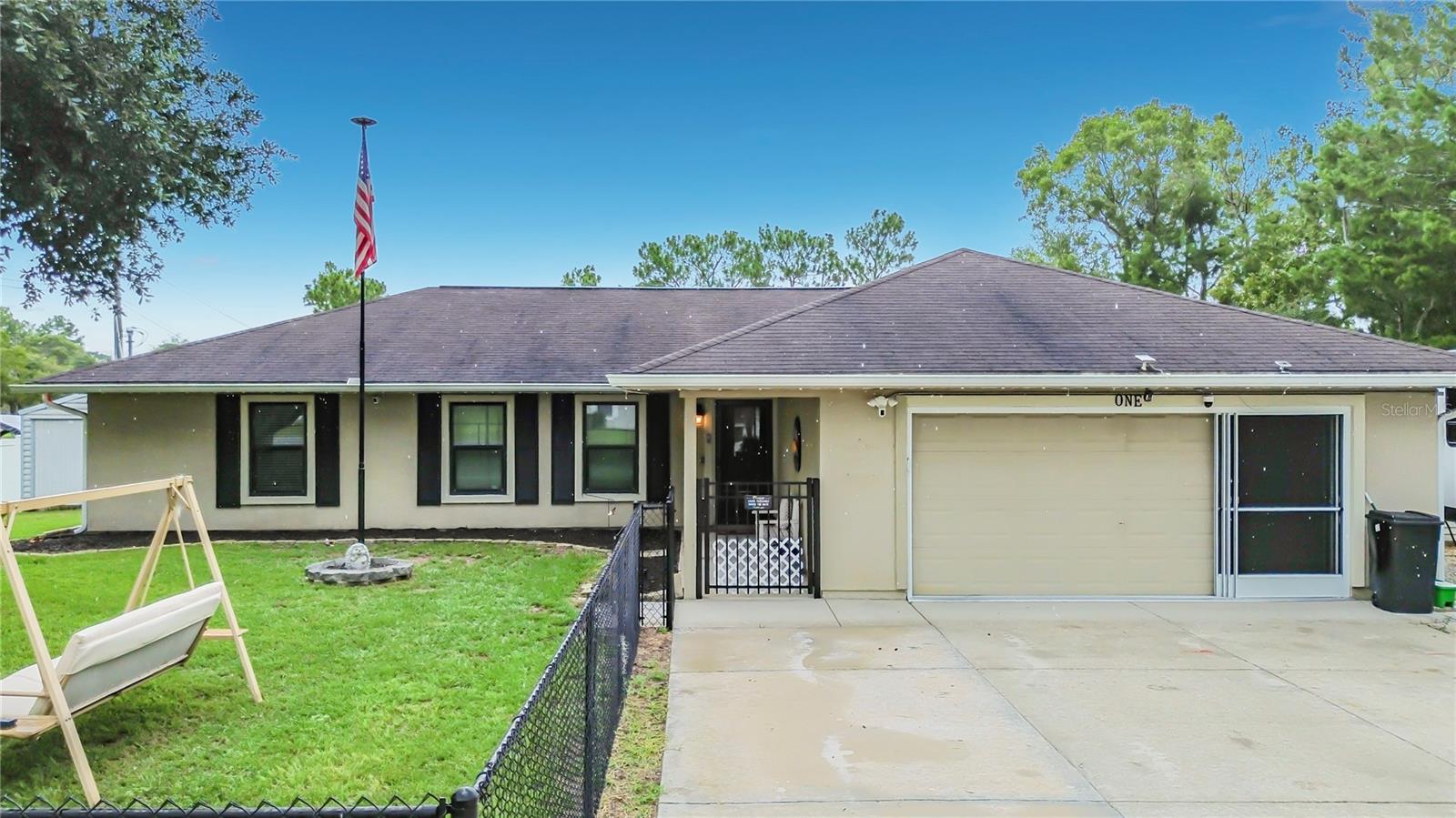 BETTER THAN NEW! This stunning, fully remodeled 1,817-square-foot home at 1 Redwood Run Ct offers all the luxury of modern living on a spacious, oversized corner lot. This turnkey 4-bedroom, 2-bathroom home features premium upgrades throughout, including elegant crown molding and durable flooring with no carpet. The chef’s kitchen is perfect for entertaining, boasting expansive counter space and custom double-sided cabinets for maximum storage. The owner’s suite serves as a private resort retreat with a spa-like bathroom renovation. Enjoy peace of mind with a fully fenced vinyl backyard, a convenient side vehicle gate, and added front-yard security fencing that enhances both safety and curb appeal. The oversized garage is a hobbyist’s dream, featuring a dedicated mini-split HVAC system for year-round climate control and a clean, durable epoxy floor. This move-in-ready property is packed with value, including a brand-new grey shingle roof (to be installed), a 2024 HVAC system, a 2024 water heater, whole-house water filtration, a 50-amp RV connection, and a whole-house generator hookup. Complete with a widened driveway, two storage sheds, and a rear paver patio, this property offers everything you need in a prime location.