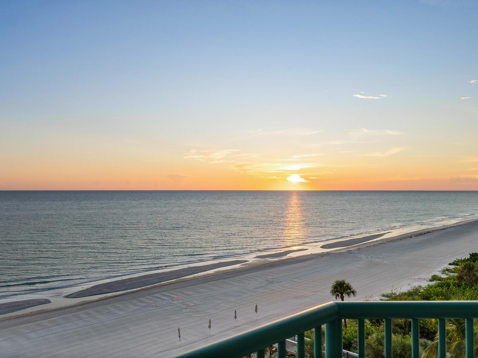 One or more photo(s) has been virtually staged. Why choose between breathtaking beach views, serene golf course vistas or the twinkling city lights when you can have them all? Welcome to Regent Place on Longboat Key, where this sixth-floor residence offers 270-degree panoramic views spanning the Gulf of Mexico, Sarasota Bay and downtown Sarasota. This 3,139-square-foot masterpiece features three bedrooms, 3.5 baths, and an incredible open floor plan designed to maximize space and scenery. Go onto the western balcony for unobstructed Gulf and beach views, visible from the expansive great room and gourmet kitchen. On the eastern balcony, take in stunning Bay and golf course views leading to the city skyline. Thoughtfully reimagined by its owners, this residence has been completely remodeled, incorporating unique storage solutions and a layout that allows for customized living spaces. Behind the gates of Longboat Key Club, Regent Place is one of the island’s most exclusive luxury communities, with just 36 residences ensuring privacy and premier amenities such as heated beachfront pool and spa, resident clubhouse and fitness center, on-site management and 24/7 security, 500-plus feet of private beach access and a pet-friendly community. Enjoy the unparalleled resort lifestyle with golf, tennis, spa services, fine dining and boating right at your doorstep. Just moments away, St. Armands Circle and downtown Sarasota offer world-class shopping, dining and entertainment. This is a one-of-a-kind opportunity to own a spectacular residence. Schedule your private showing today!