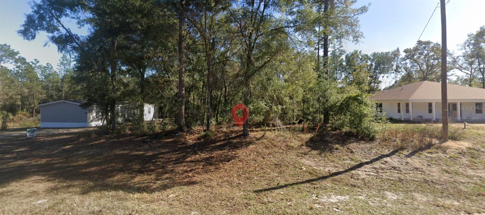 Build your dream home on this prime BUILDABLE LOT in Williston Highlands Golf & Country Club Estates, a peaceful community in the heart of Levy County. Perfect for families, couples, or golf enthusiasts, this 0.23-acre parcel offers a serene, laid-back lifestyle with no HOA fees. Enjoy the charm of downtown Williston's local shops and restaurants, while benefiting from a quick commute to both Gainesville and Ocala.