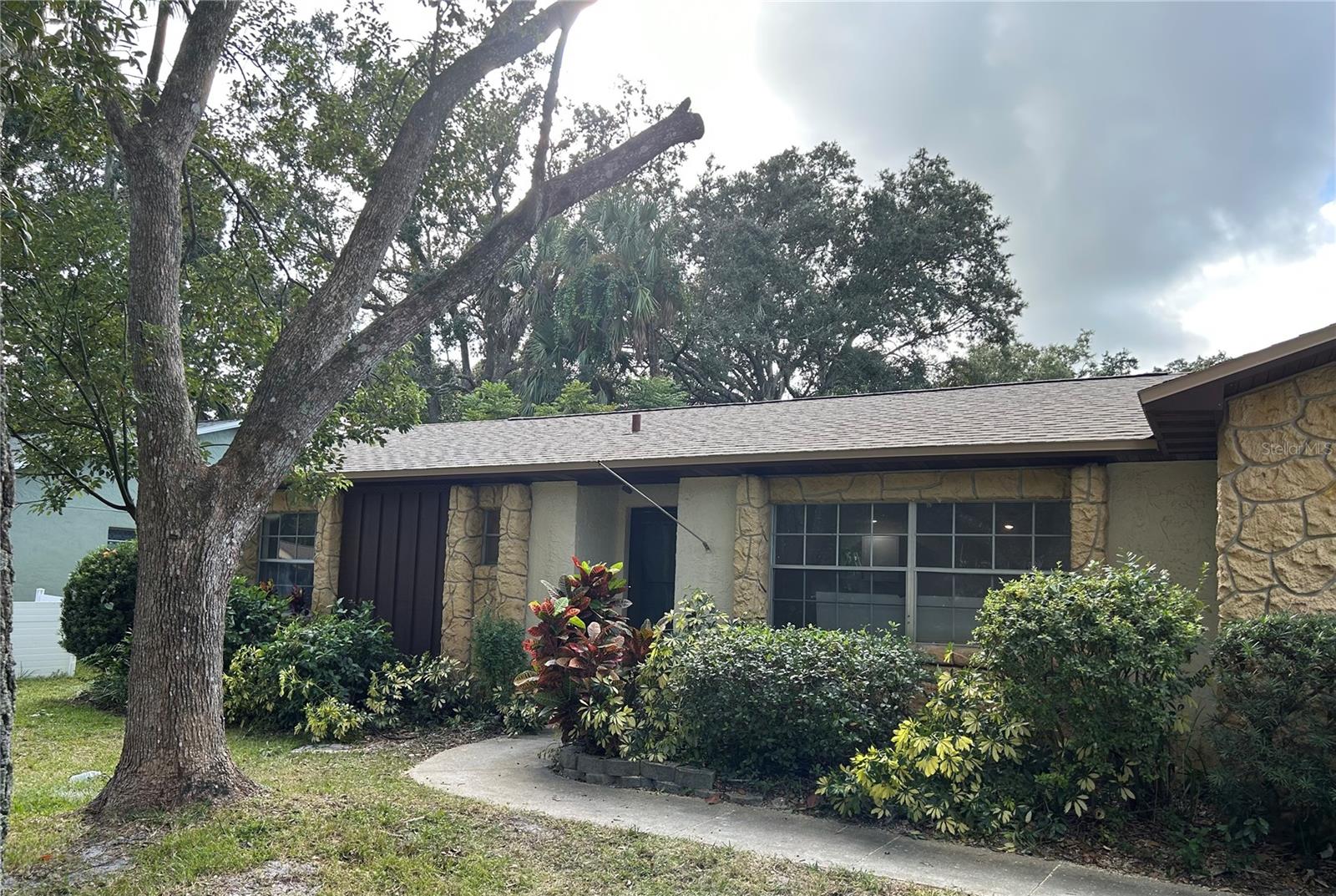 Impeccably renovated, this delightful home features a coveted 3-bedroom, 2-bathroom split floor plan. Boasting a brand-new AC, water heater, roof, and garage door opener, this residence has been fully remodeled to offer modern comfort. With convenient washer/dryer hookups, it exudes charm and coziness, nestled within the desirable community of Brandy Hills. Lawn care is a tenant incurred expense.