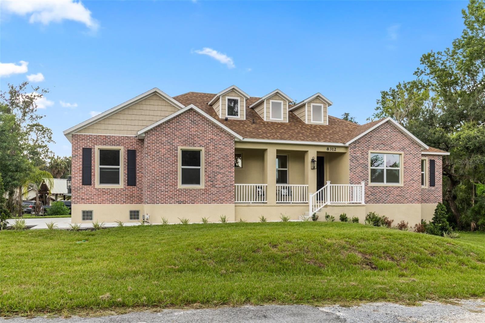 SERENITY NOW! CUSTOM BUILT 4/3 with OFFICE. Enjoy 280' frontage on the Alafia River. This one-acre lot home was built above flood grade to give you the pleasure of living on the water and the ease to do it! As you enter you will notice the soaring ceilings and gorgeous luxury vinyl plank wood styled floors. Truly high end! Living, kitchen and family rooms are flooded with natural light and allow views to your own private dock on the Alafia River. The open floor plan beckons your first house-warming party to share this bright airy space with friends and family.  Kitchen boasts 42-inch cabinets, granite stone and stainless appliances. Pull up a stool to your expansive breakfast bar and keep the cook company. Dining has versatile placement. Just far enough away is a sweet flex space that can be used as a home office, home school area, craft room or den. If you like to change things up, this floorplan is the one for you with enough space to vary living and dining spaces to customize and keep your home feeling fresh! Split floorplan with three beautiful baths featuring stylish porcelain tile. Step out to a back porch that overlooks the dock and river. Lush grass and landscaping guide you down to what feels like your own secluded bend   of the river.  Imagine sitting on the dock with a fishing pole in hand watching your cares melt away. Drop a boat in the water and paddle or cruise down the river to take in all of Florida's natural beauty. This community is peaceful and perfectly situated in a quiet spot in Riverview yet close to Tampa and all it has to offer. No HOA, No CDD. This slice of heaven awaits!