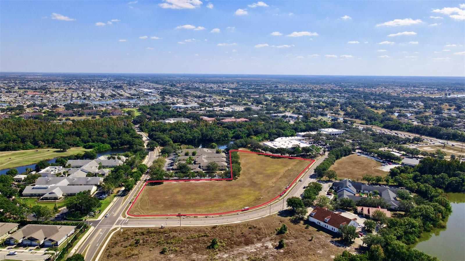 The offering consists of 5.98 acres positioned at the southeast corner of Cortaro Drive and Upper Creek Drive within the Sun City area of Hillsborough County. The site benefits from off-site retention and excellent visibility and convenient access, with frontage on both Cortaro Drive and Upper Creek Drive.

The site is zoned PD (73-0186) within The Villages of Cypress Creek. Under this designation, the property is permitted for uses consistent with the Commercial Intensive (CI) zoning district, allowing for a broad range of medical, commercial, office, and retail uses. These entitlements offer flexibility and support a variety of development concepts.

Given its location within a growing commercial corridor, its favorable zoning, and its development-ready physical characteristics, the property is well suited for a wide range of medical, professional, and commercial uses.

The property is strategically located at the southeast corner of Cortaro Drive and Upper Creek Drive within The Villages of Cypress Creek in Sun City Center—one of the most established and rapidly growing 55+ and mixed-use corridors in South Hillsborough County. The immediate area benefits from strong demographics, a large concentration of active adult communities, and a steady influx of residential development.

The site sits less than a mile east of I-75, two miles west of US Highway 301, and just north of State Road 674, the major east-west and north-south corridors that serve Sun City Center, Ruskin, Wimauma, and the broader Southshore market. Traffic volumes along SR-674 exceed 30,000 vehicles per day, creating a strong commercial environment anchored by medical providers, national retailers, assisted living facilities, and regional service businesses.