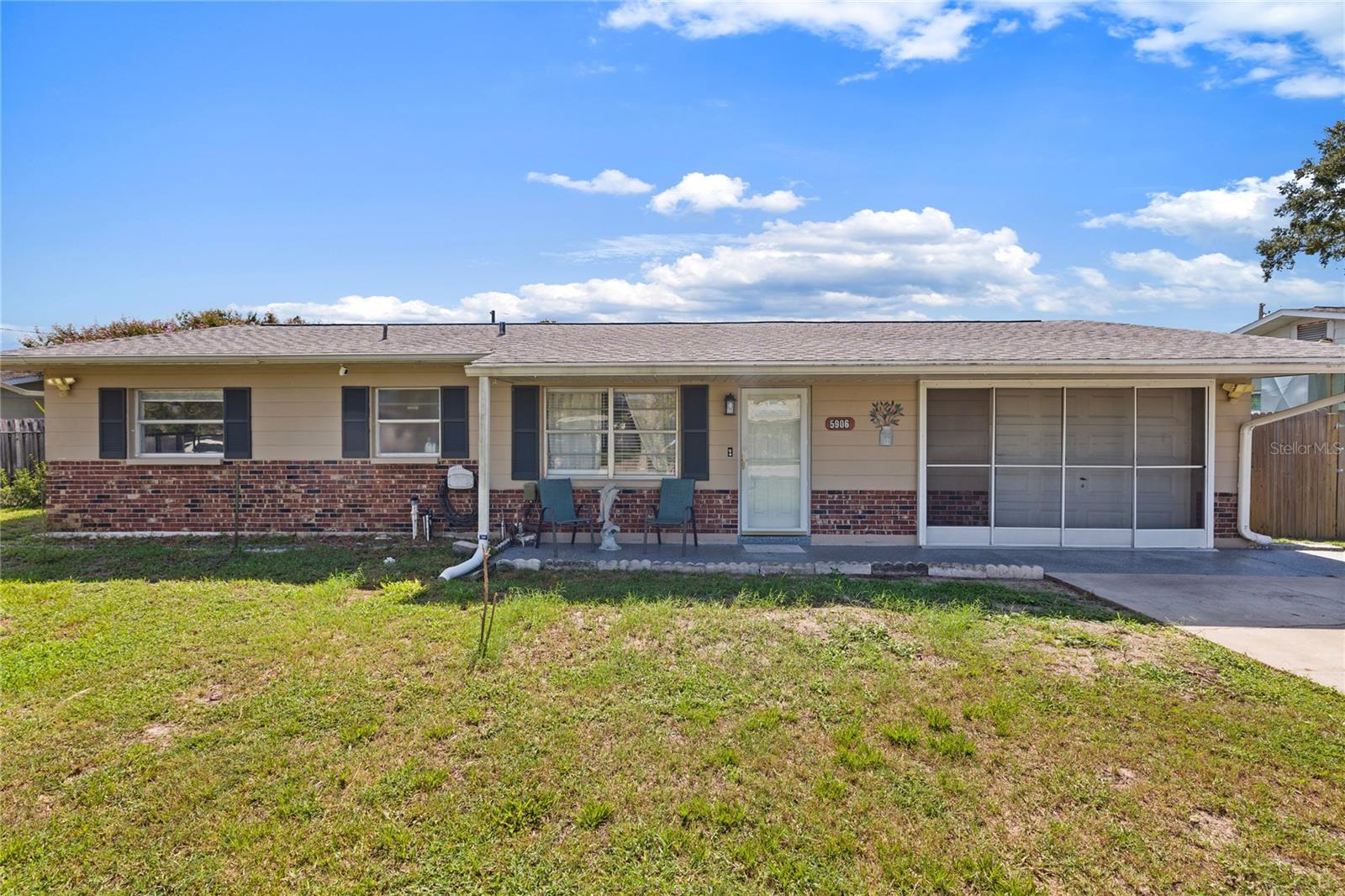 Charming and filled with high-end features, this lovely 2-bedroom, 2-bathroom home is a fantastic find. Located in Zephyrhills, it is just minutes away from everyday conveniences. Best of all, there are no HOA or CDD fees!

The home boasts excellent curb appeal with upgraded elevation details. Inside, you will find luxury vinyl plank flooring throughout, leading into a spacious living area filled with natural light. The dining area features decorative chair rail and an elegant lighting fixture.

The upscale kitchen is professionally designed and includes maple cabinetry with soft-close doors and drawers, an island, and 42" upper cabinets with crown molding. It also comes equipped with all new kitchen appliances including a glass cooktop, French door refrigerator, built-in oven and microwave, dishwasher, and a stainless-steel double bowl sink, with clever storage solutions including a lazy Susan and corner cabinets.

The main bathroom has been beautifully upgraded with contemporary finishes, including a nickel-accented vanity, mirror, light fixture, and towel accessories. The striking navy subway tile adds a rich color palette to the space.

The bedrooms are generously sized, and in addition to the main living areas, this home features a versatile bonus room. This space can be transformed into a hobby room, media room, play area, game room, office, or whatever suits your needs!

Enjoy outdoor gatherings on the large screened-in lanai, perfect for cookouts. The fenced-in backyard provides plenty of space for family activities, pets, gardening, and more. Additionally, there is an outbuilding currently set up as a workshop, complete with its own electricity—ideal for hobbies, storage, or a man-cave.

The garage offers epoxy flooring, upgraded lighting, a workbench, a full bathroom, a tankless water heater, and access to the attic with a new staircase. 

Call today to schedule your private showing!