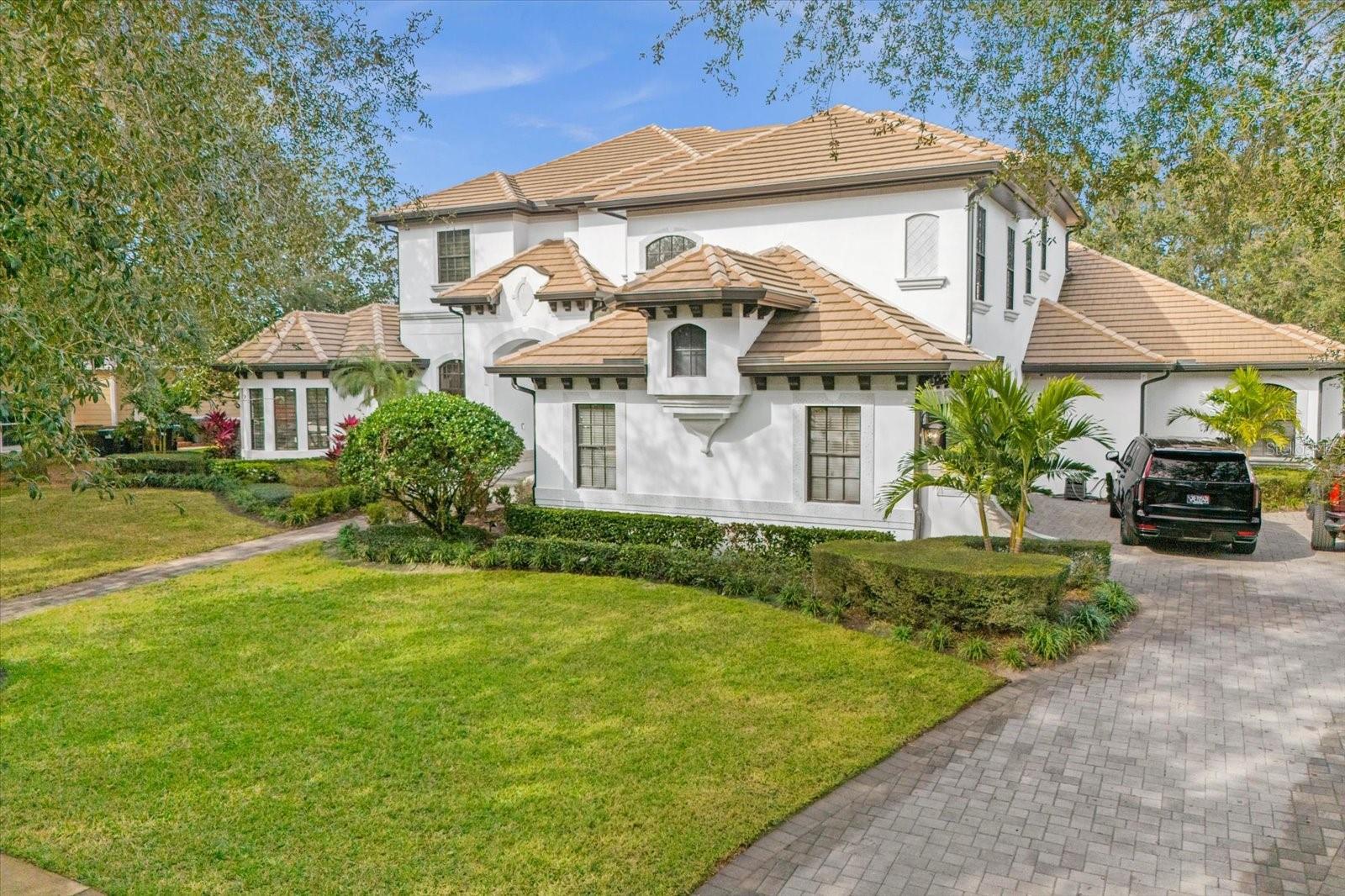 Welcome to luxury living in the prestigious Keene's Pointe Community. As you step into this home you are greeted with the opulence of high ceilings and tremendous natural light.  The elegant foyer that flows seamlessly into the spacious living areas adorned with exquisite finishes and designer touches throughout. The expansive floor plan boasts a unique 6 bedrooms and 6 bathrooms opportunity, providing ample space for both relaxation and entertainment. The gourmet kitchen is a chef's dream, boasting state-of-the-art appliances, custom cabinetry, and quartz countertops. Retreat to the sumptuous master suite, complete with a spa-like en-suite bathroom and a private sitting area overlooking the pristine fairways of the golf course. Outside, a private oasis awaits, featuring a sparkling pool surrounded by lush landscaping. This exclusive pool home combines elegance, sophistication, and tranquility in one captivating package.  Keene's Pointe, offers private membership opportunities please inquire for details. With 24-hour security and a amazing community lifestyle and atmosphere, you'll feel safe and welcomed in this prestigious enclave.