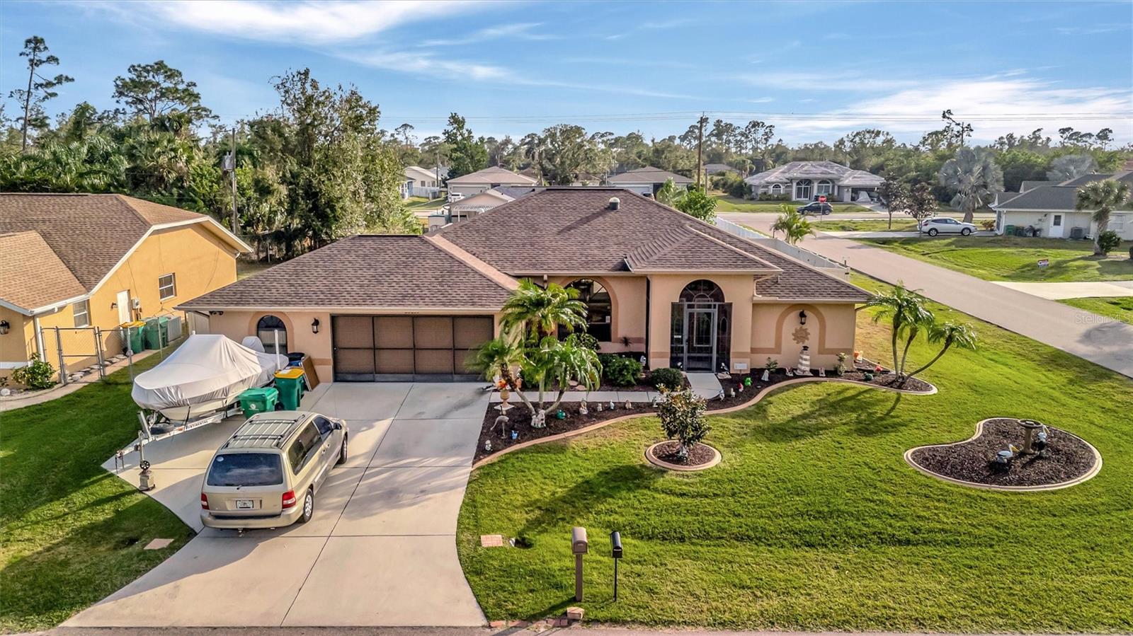 Charming 3-Bedroom Home in Port Charlotte, FL.  

Welcome to 23039 Worth Ave, a beautifully maintained 3-bedroom, 2-bathroom single-family home located in the heart of Port Charlotte. This spacious property boasts a 2.5-car attached garage, providing plenty of room for vehicles and extra storage. The large, fully-fenced backyard offers privacy and ample space for outdoor activities.

Step inside to discover an updated kitchen with modern appliances, ideal for culinary enthusiasts. Recent upgrades include a newer AC, water heater, roof, and kitchen appliances, ensuring comfort and peace of mind for years to come.

Relax and unwind in the enclosed screened lanai, perfect for enjoying the outdoors year-round. The home's corner lot is beautifully landscaped, and the extended driveway offers convenient space for your boat or recreational toys.

This move-in-ready home is a true gem, offering both comfort and convenience. Schedule your showing today and experience all that this well-cared-for home has to offer!