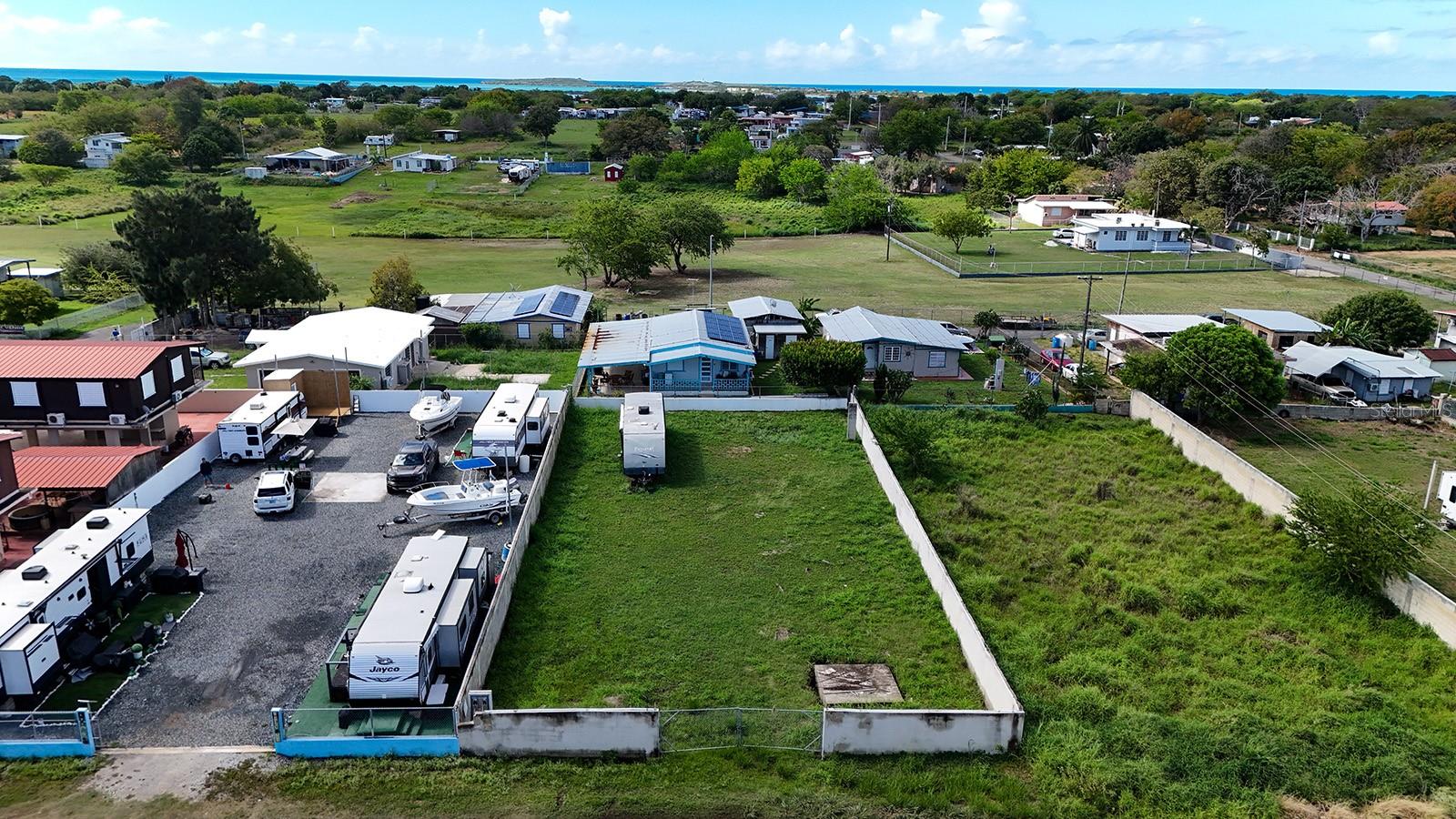 Discover a prime opportunity to own a spacious 800.22 square meter lot in the highly desirable Combate area of Puerto Rico. This well-maintained property is fully enclosed with a solid concrete fence and features a secure gated entrance, offering both privacy and peace of mind.

The lot is ready for development, already equipped with a septic tank—saving you time and initial setup costs. Whether you’re planning to build your dream home, a vacation getaway, or an investment property, this parcel provides a strong foundation. Coordinates 17.97856064,-67.19312628  

Ideally located just minutes from some of the most beautiful beaches in the region, you’ll enjoy easy access to crystal-clear waters, stunning sunsets, and a relaxed coastal lifestyle. Despite its tranquil setting, the property remains conveniently close to local amenities, dining, and recreational spots.

Don’t miss the chance to own a versatile piece of land in one of Puerto Rico’s most sought-after beach communities.

Coordinates 17.97856064,-67.19312628