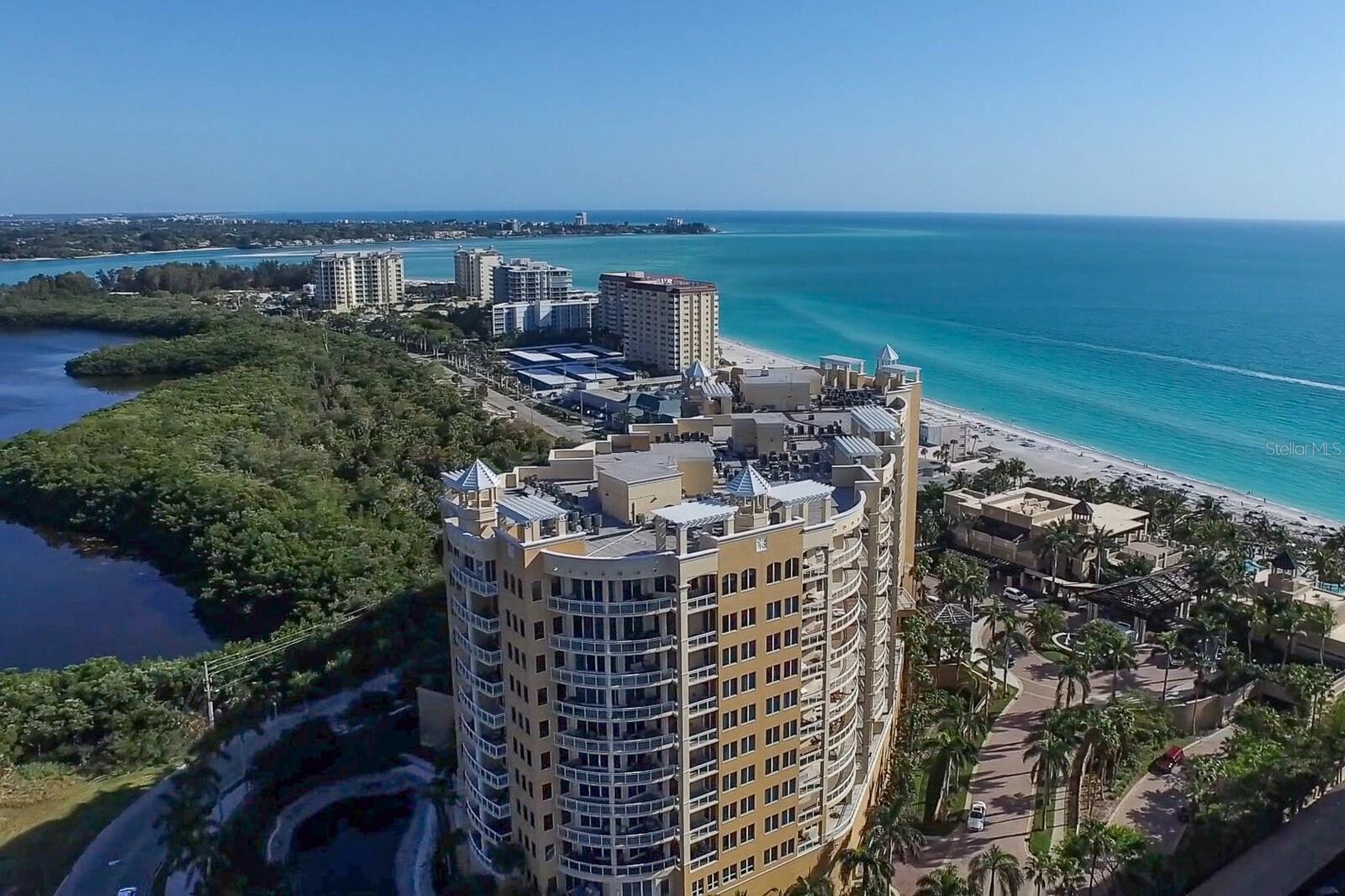 Experience the enchantment of hypnotic sunset vistas at "The Beach Residences," expertly managed by The Ritz-Carlton. This exquisite residence promises day-to-night fascination with its breathtaking Gulf views to the West and bay views to the East from the guest bedrooms and den. The majestic living area in this generously proportioned 3,861 sq. ft. home offer eleven foot ceilings which are unique to the 11th floor. The gourmet kitchen is complete with high-end appliances and luxurious finishes. The residence features beautiful hard-wood flooring throughout and is available furnished for immediate occupancy. Embrace the exclusive Ritz-Carlton lifestyle, complete with an unparalleled array of amenities, ensuring a life of seclusion and luxury. Here, you can indulge in a private pool and spa, a social room, a well-appointed kitchen, a boardroom for your business needs, and a billiards room as well for recreation. Movie enthusiasts can revel in the on-site theater with tiered seating, while those seeking relaxation can visit the massage room.
 
The attentive 24-hour concierge service ensures all your needs are met. Maintain your well-being at the state-of-the-art fitness center, and provide your guests with comfort in the available guest suites. Even your furry companions are catered to with a convenient dog run. The comprehensive maintenance fee covers an array of services including building exterior maintenance, cable and internet, escrow reserve funds, flood insurance, ground upkeep, building insurance, maintenance and repairs, managerial services, public insurance, recreational facilities, roof maintenance, security, trash removal, and water and sewer expenses. At "The Beach Residences," pets are not only welcome but celebrated, with no weight limit imposed. Plus, you're only moments away from the vibrant St. Armands Circle and the rich cultural offerings of downtown Sarasota. This residence is not just a home; it's a gateway to an opulent coastal lifestyle.
