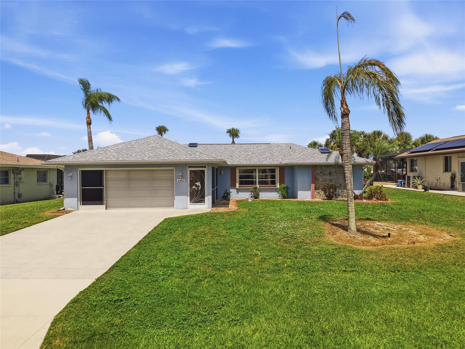 Experience the best of Florida waterfront living in this beautifully maintained pool home located on a saltwater canal with quick access to Charlotte Harbor and the Gulf beyond. Boaters will appreciate the private dock featuring an 8,500-lb boat lift, making it easy to enjoy days on the water right from your backyard.

This home has been thoughtfully updated for peace of mind, including a new roof (2023) and A/C system (2021). Hurricane shutters provide added storm protection, and the seller reports the home did not experience flooding during the recent hurricanes.

Inside, you'll find a bright, open layout with 3 bedrooms, 2 bathrooms, and a 2-car garage, designed for comfortable living and entertaining. Skylights fill the home with abundant natural light, creating a warm and inviting atmosphere throughout. Step outside to your private screened pool and spacious lanai, the perfect place to relax while taking in the tranquil canal views. Whether you're fishing from your dock, heading out for a day of boating, or simply enjoying the Florida sunshine, this property offers the waterfront lifestyle you've been dreaming of.

Conveniently located near shopping, dining, golf courses, parks, downtown Punta Gorda, Fishermen's Village, and world-class fishing and boating, this exceptional home combines comfort, convenience, and direct water access in one outstanding package.