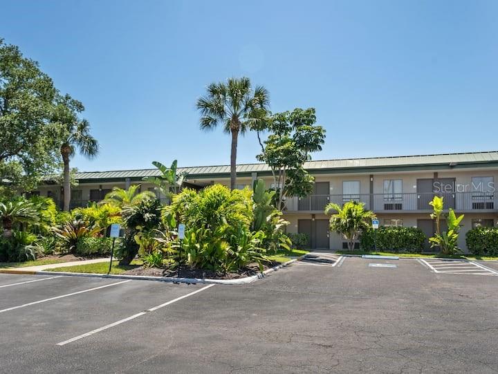 S-613 TURN KEY! (Everything is included in the sale!) A SECOND-FLOOR CITY VIEW Experience our cozy unit located at the Ramada by Wyndham Sarasota in Whitfield, Florida, near Siesta Key Beach, Anna Maria Beach, Lido Key, & many other white sand beaches! Enjoy two queen beds, a full bathroom, a heated pool, and an on-site restaurant. Surrounded by lush shrubbery, our tranquil retreat features a marina for kayaking and boat adventures. Explore nearby Downtown Sarasota for dining, shopping, and entertainment. Relax and enjoy the best of Florida's Gulf Coast! Welcome to the Sarasota Cay Club. This property is approximately two miles north of Sarasota Bradenton International Airport, just minutes from great shopping, museums, art galleries, restaurants, farmers' markets, and other unique entertainment opportunities. This area is also well-known for its destination vacations, boasting some of the best beaches in the country, including Holmes Beach, Coquina Beach, Lido Beach, Longboat Key Beach, and Siesta Key Beach. These privately owned condo residences are in the ‘Ramada By Wyndham Sarasota Waterfront Resort’. Each residence allows daily and short-term rentals with no minimum leasing restrictions. Enjoy staying in these units, which are situated within a waterfront property offering direct access to the Gulf waters. Owners can utilize their condo as a vacation property throughout the year. Enjoy the Ramada Hotel's Resort Lifestyle with amenities that include a newly remodeled onsite waterfront restaurant/tiki bar, ‘Tarpon Bay Grill and Tiki Bar’, heated waterfront pool, beach volleyball, fitness room, roaming security, community laundry, and open common areas. The monthly Condo-Hotel HOA fees include all utilities (Electric, Water, Internet, Cable, Phone, Sewer, and Trash), Exterior Maintenance, and interior common areas, making your overhead expenses minimal and easy to budget. This rare income-producing investment opportunity allows you to enjoy all the amenities of beautiful Southwest Florida.