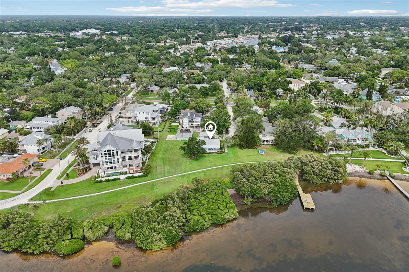 Virtually Staged. Stunning Waterfront House in charming Crystal Beach. House has been fully updated and passed all inspections. ALL kitchen appliances brand new never used, 7 year AC with new ducts, Brand new countertops and cabinets. Must see the stunning views with this incredible lot! Unobstructed views of the water from kitchen, Florida room, living room and dining area. Over 60 foot of water frontage with easy Kayak/ Jon Boat/ Wading access. Must see this oversized lot with a stunning move in ready house. Extra room is set up for plumbing and a wet bar, garage is set up to add an addition and the AIRBNB properties in Crystal Beach always sell. Awesome restrictions. Right off the trail and a short walk to the community park. All A rated schools. Don’t miss out and make this your dream house. Best Lot in Pinellas county. The sunsets are a dream so perfect viewing time would be right at Sunset. Act now this beauty won’t last long.