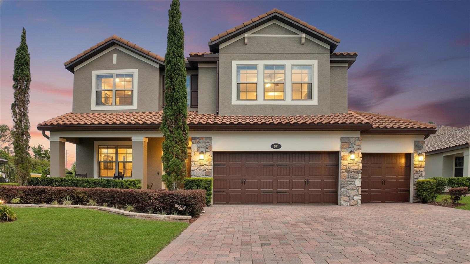 Seller Motivated 5 bedroom 3 bath with rare split 4-car garage including tandem bay. This homes is 3604 SqFt with a total of 4,827 SqFt with Garage Space. Professionally designed by an interior designer. This stunning executive home with flex space sits on a coveted oversized corner lot with conservation and water views. The rare four-car garage with tandem is perfect for a boat and single bay configuration perfect for a golf cart or vehicle. Expanded paver driveway, upgraded stonework and fresh exterior Sherwin-Williams Latitude paint extended-life coating. This home blends luxury upgrades, smart technology, and resort-style outdoor living, making it ideal for both entertaining and everyday comfort. The interior features granite and quartz countertops, built in pot filler plumbing upgrade, new upgraded GE Café appliances with a gas stove, a refrigerator with built-in Keurig coffee system, an apron-front stainless-steel sink, and Moen plumbing fixtures. The custom pantry with wood shelving and hidden barn door entry is a must see! Flooring includes upgraded luxury vinyl plank and porcelain tile throughout the main living areas, with designer carpeting and upgraded padding in the owner’s suite. Architectural details include custom trim, stacked stone accents, arched openings, tray ceilings with beams in the owner’s suite, designer lighting and fans, recessed lighting throughout, and a built-in electric fireplace feature wall with porcelain tile. The home offers a dedicated theater and bar room with Kraftmaid cabinetry, ceiling speakers with wifi-controlled color-changing lighting. Smart home features include app-controlled thermostat, switches, garage doors with Alexa compatibility. Additional upgrades include a motorized Hunter Douglas shade on the sliding glass door and custom drapery and window treatments throughout. Energy and comfort enhancements include an upgraded HVAC system w/ UV air purification, LED lighting, and gutters upgrade on two tier roof line. 
Outdoor living is designed for a true resort experience. This property is fully fenced with privacy walls, lA motorized Sunsetter awning with LED lighting and new Sunbrella fabric provides additional shade. The backyard also includes a permitted gas fire pit with custom seating area with Adirondack chairs, expansive paver patio and walkways.  A scenic pergola with an Italian stone fountain is on the front of the property able to be enjoyed from the extended covered front porch or second floors. Pond view is enjoyed from the front porch or second floor. The community offers HOA-maintained landscaping including palm tree trimming and up lighting, as well as access to a boat ramp and fishing dock.  Proximity to amenities is ideal as the resort style pool is just steps away. The clubhouse includes a fitness center, playroom, theater, and entertainment space, along with on-site management. Furnishings are negotiable depending on the offer. Schedule your showing today. Use our preferred lender and get 2k toward closing cost. Purchase this home, if YOU Are Not Satisfied, We'll SELL IT FOR FREE! *First Responders and Military Members Ask About our appreciation discount. Exclusive offer...Purchase this home with VA 0% DOWN available for those who qualify. Rate buydown options available! For more information on these exclusive offers call the listing agent directly see the info below.