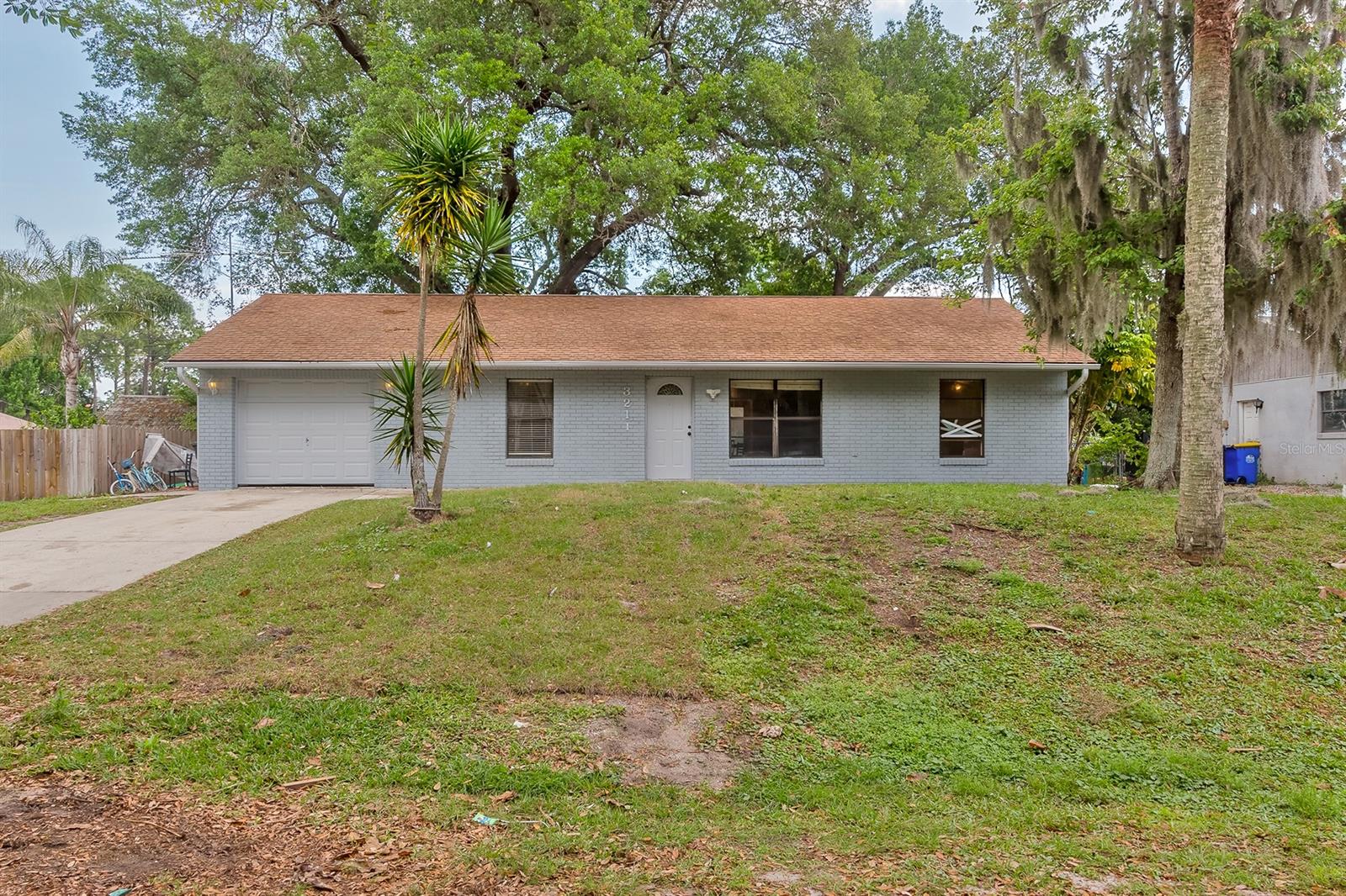 Calling all CASH buyers and flippers!  This one is all about location and potential.  If you are looking for an opportunity to do a home makeover, this one is for you!  This 3 bedroom 2 bath split plan house with a 1 car garage sits on a large lot with mature trees and no HOA in the southwest section of Florida Shores. ;Water: City