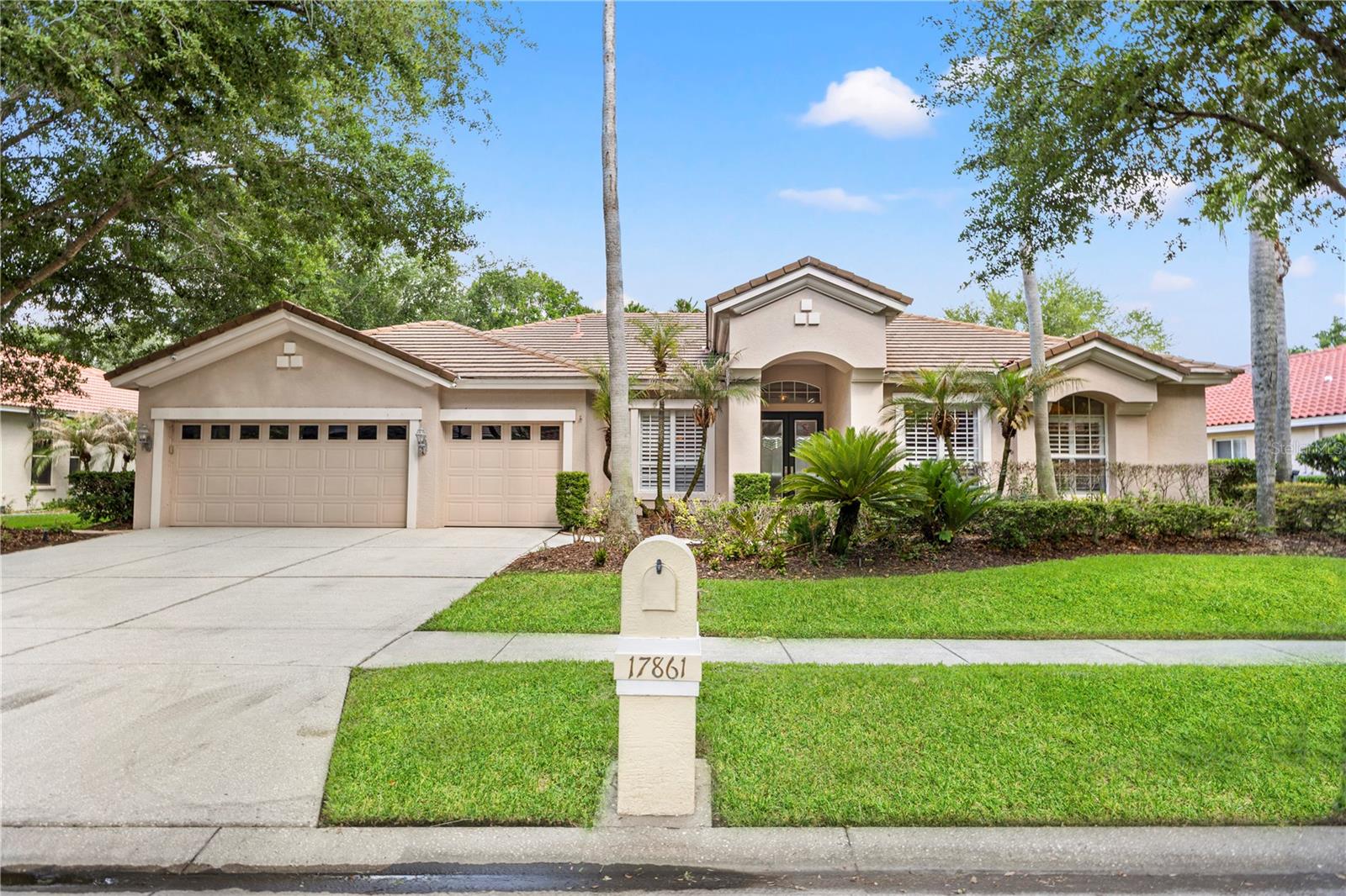 Space, style, location, and the Florida lifestyle all come together at 17861 Arbor Greene Drive, an impressive Arthur Rutenberg St. Augustine model in the gated Enclave of Arbor Greene. This spacious new listing offers 6 bedrooms, with the 6th bedroom currently serving as a bonus room, plus an office, 3.5 baths, and a 3-car garage. Designed for comfortable everyday living and effortless entertaining, the home features a bright, open floor plan with soaring ceilings and beautiful architectural detail throughout.


From the moment you enter through the leaded glass front doors, you are welcomed by formal living and dining rooms with 12-foot ceilings, deep crown molding, plantation shutters, upgraded lighting, and elegant designer touches. The family room makes a dramatic statement with a cathedral ceiling, crown molding, and a contemporary electric fireplace that can be converted back to wood burning, as the chimney is already in place.

The expansive gourmet kitchen is well-appointed with stainless steel appliances, granite countertops, stainless tile backsplash, 42-inch maple cabinetry with pull-outs, single oven, smooth-top range, stainless sink, breakfast bar, spacious dinette area, walk-in pantry, recipe desk, and water softener. Open to the main living areas, the kitchen is ideal for gatherings, holidays, and everyday connection.

The owner’s retreat offers wood flooring, an extended sitting area, and generous his-and-her walk-in closets. The owner’s bath features a large soaking tub accented by columns, step-in shower, split cultured marble vanities with wash basins, and a spacious layout. Secondary bedrooms provide excellent flexibility for family, guests, hobbies, fitness, or additional work-from-home space. A Jack and Jill bath features dual sinks and a tub/shower combination, while a powder bath is conveniently located near the office.

Outdoor living is a true highlight with a gas-heated pool and spa set on a brick paver lanai, creating the perfect space to relax, entertain, and enjoy the Florida lifestyle. Located in Arbor Greene, one of New Tampa’s premier gated communities, residents enjoy resort-style amenities including a clubhouse, fitness center, community pool, tennis courts, playgrounds, scenic walking areas, and a convenient location near top-rated schools, shopping, dining, hospitals, USF, major roadways, downtown Tampa, and Tampa International Airport.

Welcome Home!