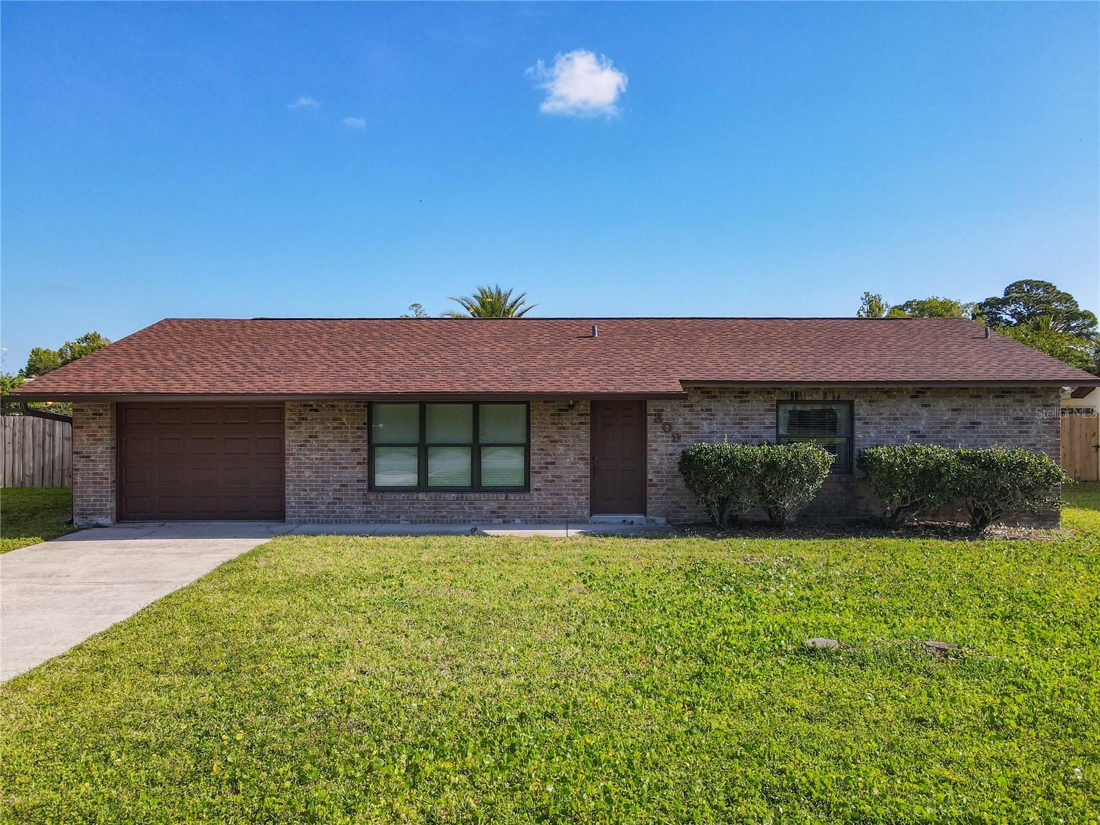 Beautifully maintained and truly move-in ready, this charming pool home in the Wildwood neighborhood offers the perfect blend of comfort, convenience, and Florida living at its finest. Featuring two spacious bedrooms, two full bathrooms, and an oversized one-car garage, this home is being sold completely furnished, making your transition effortless from day one. Recent updates include a freshly painted exterior, a brand-new roof, new fence, new gutters, adding both curb appeal and peace of mind.

Inside, you’ll find a bright and inviting layout with ceiling fans throughout, a walk-in closet, and an abundance of storage space. The oversized garage is equipped with a workbench, garage door opener, and hurricane shutter panels for added protection during storm season. This exceptionally well-kept home also includes a transferable termite bond and access to natural gas.

Step outside to your own private retreat featuring a screened-in patio overlooking the sparkling pool area — the perfect setting to relax, entertain guests, or enjoy the Florida sunshine year-round. With no HOA, you’ll appreciate the freedom and flexibility homeowners are looking for.

Conveniently located near shopping, dining, major highways, and just minutes from New Smyrna Beach, this property is ideal as a starter home, seasonal getaway, or low-maintenance full-time residence. Homes this well cared for and completely move-in ready are hard to find — schedule your private showing today and experience everything this wonderful home has.
