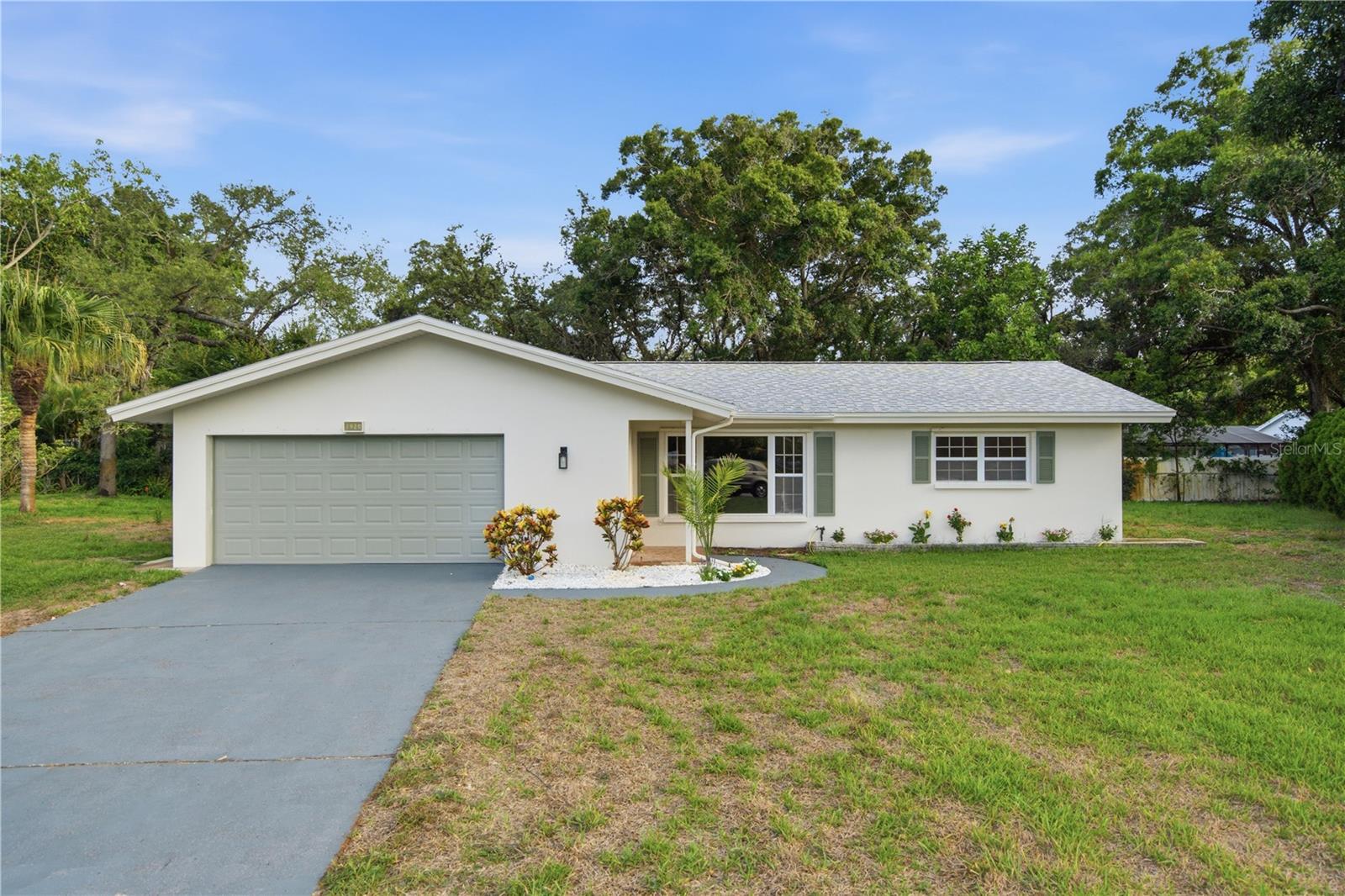 Welcome to Dunedin, one of Tampa Bay’s most beloved coastal communities, where small-town charm, Gulf Coast beauty, and an active local lifestyle come together. 

Tucked at the end of a quiet cul-de-sac, this newly renovated 3-bedroom, 2-bathroom home offers nearly 1,500 sqft of living space, a spacious 2-car garage, and a generous quarter-acre lot. No expense was spared in the thoughtful renovation of this move-in-ready home. Stepping inside, luxury vinyl plank flooring flows throughout the open-concept floorplan. The living room transitions seamlessly into the dining area and beautifully redesigned kitchen, creating an inviting space for everyday living and entertaining. The kitchen stuns with quartz countertops, a waterfall-edge peninsula, brand-new stainless steel appliances, two-tone cabinetry, and a gorgeous backsplash extending from the countertops to the ceiling.

Both bathrooms have been thoughtfully remodeled with quartz countertops, modern vanities, arched mirrors, and coordinating brushed-gold fixtures. One bathroom features a tub and shower combination surrounded by elegant floor-to-ceiling tile with a decorative niche, while the second showcases a spacious walk-in shower finished with contemporary designer tile. A dedicated laundry room provides additional storage and a modern utility sink.

Major improvements include a new roof completed in 2022 and a new electrical panel installed in 2026, offering added peace of mind. 

From this convenient location, you can take your golf cart into vibrant Downtown Dunedin to explore locally owned restaurants, breweries, boutiques, waterfront parks, festivals, and the popular Downtown Market. Spend the day biking the Pinellas Trail, playing a round at the historic Dunedin Golf Club, catching a spring training game at TD Ballpark, or heading to the Dunedin Causeway and Honeymoon Island for kayaking, beach days, and unforgettable sunsets. Caladesi Island, Hammock Park, Clearwater Beach, shopping, and everyday conveniences are also within easy reach.


Whether you are searching for a full-time residence, seasonal escape, or opportunity to enjoy the laid-back Florida lifestyle, this beautifully renovated home places you close to everything locals love about living in Dunedin. Schedule your showing today!