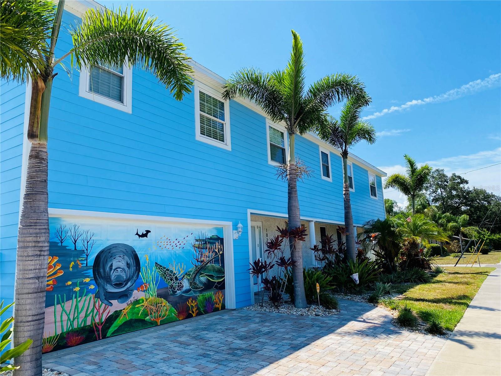 Welcome to your dream home in the heart of Gulfport, FL! This exquisite 5-bedroom, 5-bathroom residence offers a perfect blend of elegance and comfort. Nestled on a desirable corner lot, this home boasts a stunning saltwater pool, providing a serene oasis right in your backyard. Step inside to discover a bright and spacious interior, highlighted by four sets of French doors that seamlessly connect the indoor and outdoor living spaces. The lush tropical landscape surrounding the home creates a private, tranquil retreat, while the fenced-in backyard offers both security and seclusion. The two-car garage provides ample space for vehicles and storage, and the open layout of the home ensures plenty of room for family and guests. Each bedroom is generously sized, offering a comfortable and inviting atmosphere. The five bathrooms are tastefully designed, featuring modern fixtures and finishes. Perfectly located in Gulfport, this home is close to local amenities, parks, and the beautiful Gulf Coast beaches. Don’t miss this opportunity to own a slice of paradise! Schedule your private tour today and experience the charm and beauty of this exceptional property.