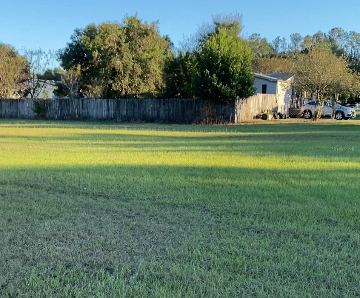Build your dream home on this prime residential lot located along the scenic SE Sunset Harbor Road in Summerfield. This property offers a peaceful atmosphere characterized by mature oak canopies and a tranquil residential feel, providing an ideal foundation for a private retreat or investment. Positioned near the shores of Lake Weir, the location puts you minutes away from public boat ramps and the hiking and swimming at Carney Island Recreation and Conservation Area. While the setting is serene, it remains remarkably close to the dining, shopping, and entertainment of Spanish Springs Town Square and The Villages. Paved road frontage ensures easy access, with US-441 and I-75 nearby for a quick commute to Ocala or Lady Lake. This site features the flexibility of R-4 zoning and sits within an established community known for its open green spaces and lack of high-density congestion. Take advantage of this opportunity to secure a blank canvas in a location that perfectly balances outdoor recreation with modern convenience. Buyer is responsible for verifying all zoning, utility connections, and building requirements with Marion County.