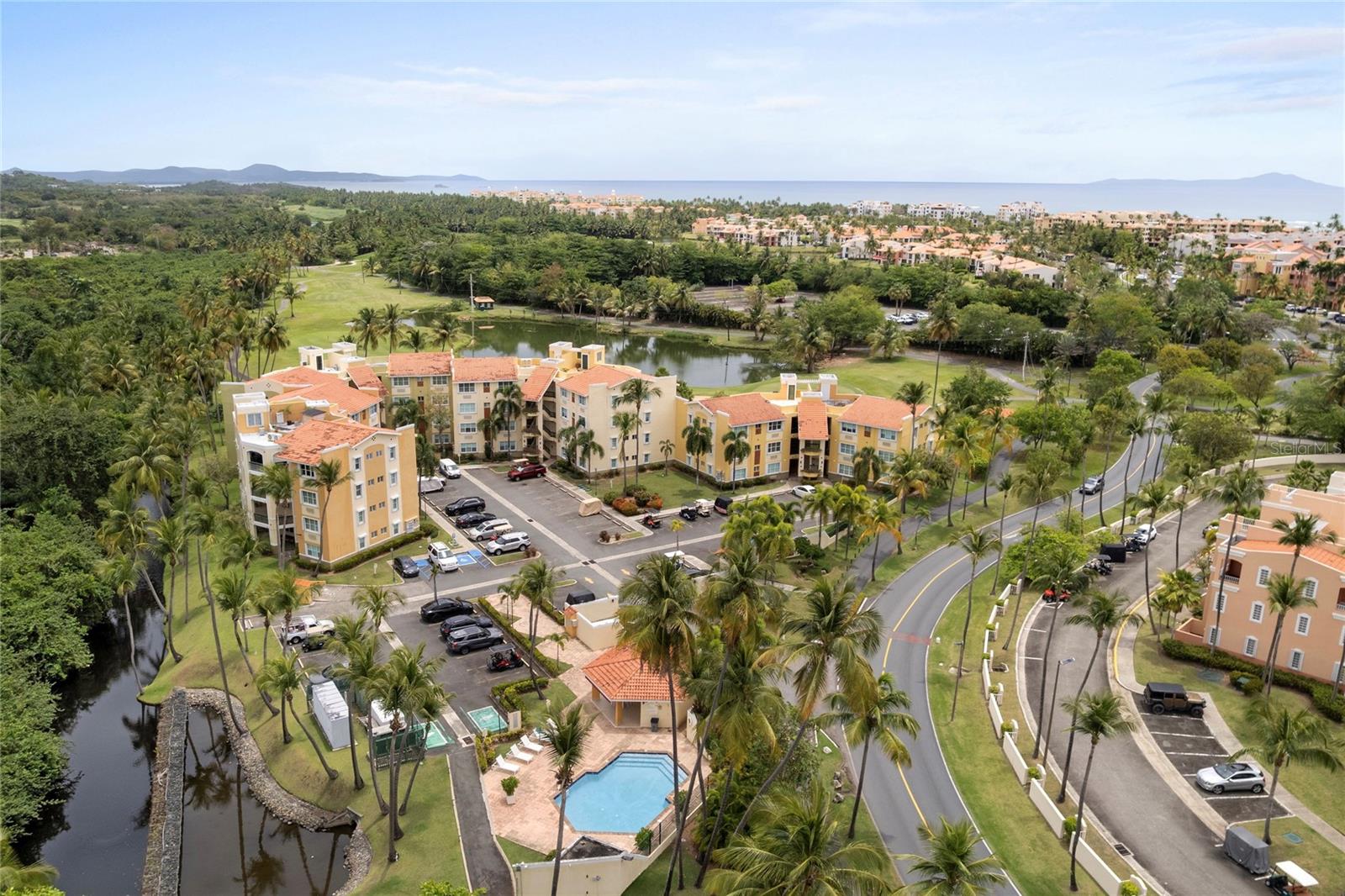 Experience the ultimate coastal lifestyle at Casillas de Palmas, an exclusive enclave within the renowned Palmas del Mar resort in Humacao. This residence features 3 bedrooms, 2 full bathrooms, and 1 powder room, encompassing a generous 2,194 square feet of living space. Palmas del Mar is one of the largest master-planned communities in the Caribbean, boasting its own top-tier academy, two championship golf courses, and the largest tennis center in Puerto Rico, essentially creating a "city within a resort. This property is surrounded by lush green landscapes and scenic golf course views, offering a tranquil atmosphere with unparalleled privacy. Its privileged location ensures you are just a short golf-cart ride away from pristine beaches, a world-class marina, and an array of fine dining options. Perfectly blending comfort and space, this home represents a premier opportunity for those seeking a refined residential experience in a world-class destination. CRIM: $1,796.00 annually HOA: $467.00 monthly.