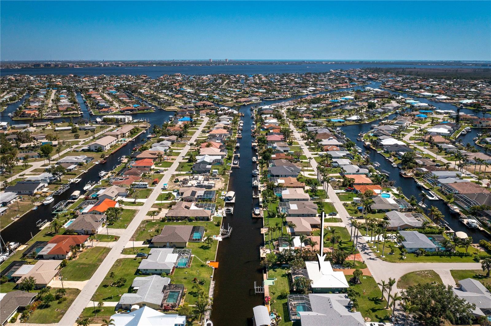 Premier Boating Location – Direct Gulf Access (No Bridges, No Locks!) Experience the ultimate Florida lifestyle in this beautifully updated 3-bedroom, 2-bath pool home, ideally located in the highly sought-after Unit 2 area of Cape Coral—surrounded by multi-million dollar properties. Currently operating as a successful vacation rental with strong ROI potential, this property offers both personal enjoyment and income opportunity. Enjoy direct access to open water in just 13.8 minutes, making this a true boater’s dream. You’re only a 5-minute drive or 20-minute boat ride to Tarpon Point Marina for waterfront dining, shopping, and entertainment—and just 5 minutes from downtown Cape Coral. Recent updates include: Fresh interior and exterior paint New quartz countertops in the kitchen and bathrooms Brand-new kitchen appliances Updated bathroom vanities New flooring throughout Step outside to your private pool area, perfect for relaxing or entertaining in your own tropical oasis. Whether you’re looking for a move-in-ready primary residence, vacation home, or income-producing property, this one checks all the boxes. Don’t miss this incredible opportunity—start living (and earning) the dream today!