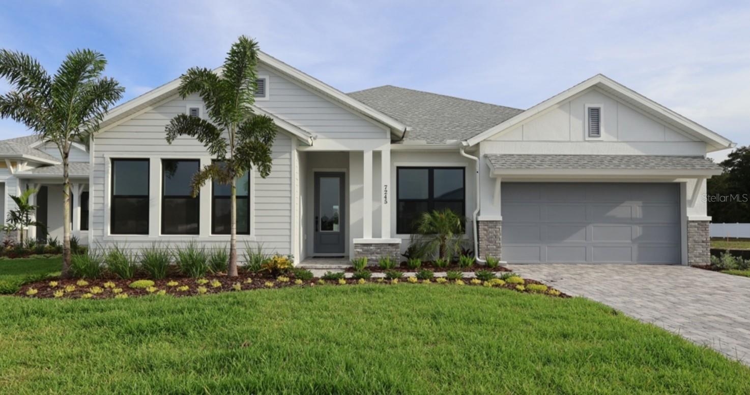 Live in luxury with The Colston floor plan, by David Weekley homes, located in the brand-new, suburban lifestyle, gated community of Lakeview Crossing in Sarasota. This single-story home gives you over 3,000 sq ft of comfort, sitting peacefully on a pond, where you can imagine coming home to serene views with sightlines of the pond from the moment you walk in the front door. Once inside, you’ll love the thoughtfully designed open concept with vaulted ceilings in the main living areas, flooded with natural light and a designer kitchen perfect for celebrating all of life’s milestones.  The French County interior design selections give this home a warm and comforting feel you won’t want to leave. The owner’s retreat is split from the guest bedrooms, so you will have your own private oasis to wind down and feel royal in. In addition to the 4 bedrooms, there is a dedicated den with French doors where you can work in peace as well as a TV/bonus room the family can sneak away in. The 4-car tandem garage gives you plenty of storage and space to park all your vehicles, and the extra spacious indoor utility room will make you want to do your laundry more.  Enjoy your morning coffee or evening glass of wine out back on your extended lanai or even on the spacious front porch where you can watch the kids play. Sitting on an oversized lot, you have plenty of room to add a pool and create the backyard oasis of your dreams. Also, you are conveniently located close to downtown Sarasota (10 miles), UTC shopping center (9.4 miles), Siesta Key Beach (12 miles) & SQR airport (15 miles). Experience the Best in Design, Choice and Service with this new David Weekley home in Sarasota, FL. **This property offers a limited-time interest rate incentive.