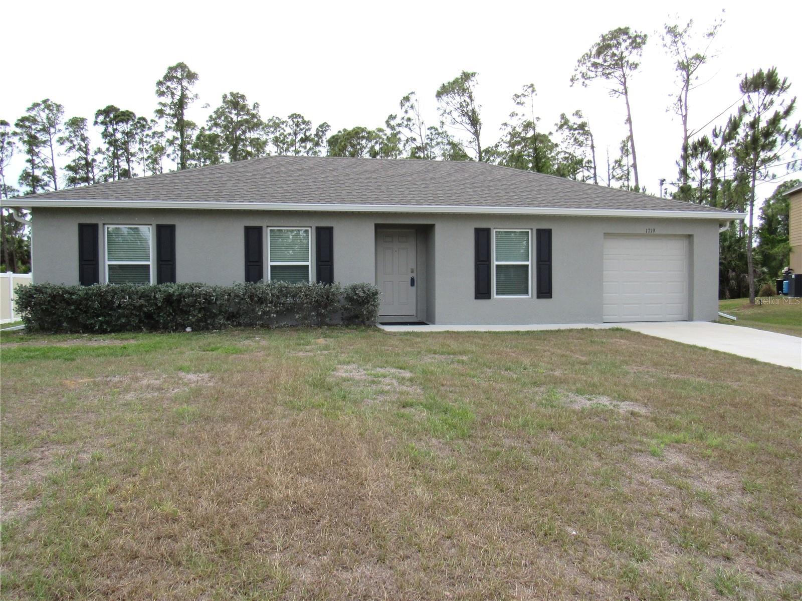 Situated on an oversized, quiet cul-de-sac, this 2024 home is ready for you to move right in!  The open floor plan feels much larger that the square footage shows.  The kitchen features wood cabinetry, stainless appliances, a large breakfast bar, kitchen RO system and a pantry.  There are sliders from the dining area affording you the view of the private backyard.  Beyond the foliage is a freshwater canal.  The ensuite master bedroom features a nice sized bath with a walk-in shower. NO HOA fees!  This home is in a great location very near the new Imagine School campus with easy access to I-75 and just minutes to shopping, restaurants, golf, fishing, Historic Downtown Punta Gorda and Fisherman's Village.  North Port is one of Florida's fastest growing cities offering the perfect combination of affordability, convenience and quality. You are only a short drive to the Gulf Coast Beaches.  It's a great place to live, work and play.  Call today to schedule a showing for your new home!