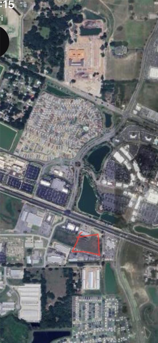 Highly sought after commercial building site located in the middle of premier retirement community The Villages. Directly across from Brownwood Paddock Square. Cleared +-3.27 acre site within Wildwood city limits. Adjacent to The Villages new Emergency Room on SR 44. Access to natural gas, sewer, water and public utilities, Retention on west side of property.