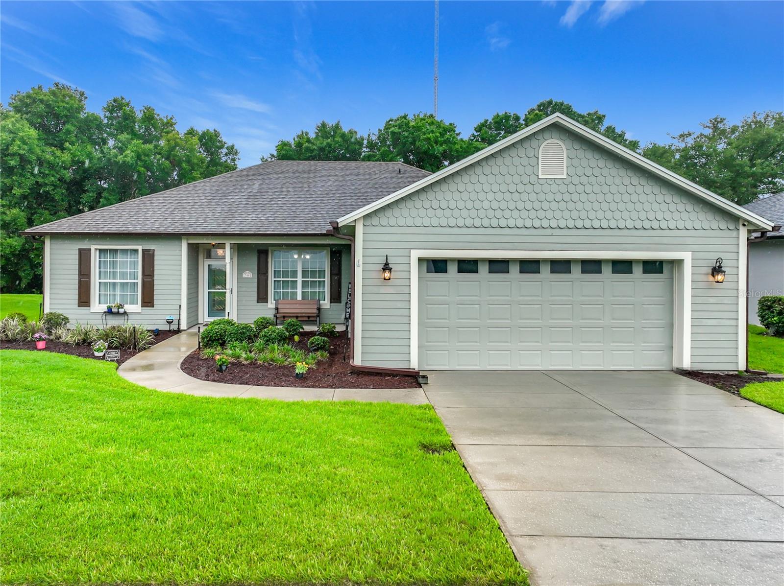 COMPLETELY REMODELED AND MOVE-IN READY WITH MAJOR SYSTEM UPDATES! Tucked away on a QUIET DEAD-END STREET, this exceptional 3-BEDROOM, 2-BATH CUSTOM HOME offers the perfect blend of privacy, convenience, and modern upgrades. Situated on OVER 1/3 ACRE with NO REAR NEIGHBORS and protected wooded views behind the property, this is a rare opportunity to enjoy peaceful living while remaining close to everything Central Florida has to offer.

Originally built in 2003 and extensively renovated from top to bottom in 2021, this 2,138-SQUARE-FOOT single-story residence showcases quality craftsmanship and thoughtful design throughout. Soaring 10-FOOT CEILINGS, CONTEMPORARY CROWN MOLDING, oversized 5.25-INCH BASEBOARDS, and PREMIUM VINYL FLOORING create a bright and sophisticated atmosphere from the moment you enter. Energy-efficient LED recessed lighting with dimmers and numerous custom upgrades make this home truly move-in ready.

The redesigned kitchen is both stylish and functional, featuring QUARTZ COUNTERTOPS, SOFT-CLOSE CABINETRY, STAINLESS LG APPLIANCES, a modern aluminum backsplash, abundant prep space, and a spacious breakfast bar ideal for casual dining and entertaining. Designed for both everyday living and hosting, the kitchen also provides ample room for a breakfast table and seamless access to the home's main living areas.

The spacious owner's suite has been thoughtfully reimagined to provide a true retreat, complete with a luxurious owner's bathroom featuring DOUBLE VANITIES, a seamless glass walk-in shower, private water closet, and an oversized custom walk-in closet with premium wood shelving.

Adjacent to the kitchen, the laundry room includes a washer and dryer on built-in pedestals and provides direct access to one of the home's most impressive features: an approximately 1,000-SQUARE-FOOT GARAGE with durable EPOXY-COATED FLOORS. With room for multiple vehicles, a trailered boat, workshop space, storage, and more, this garage is a dream for hobbyists, collectors, and outdoor enthusiasts alike. For added comfort, a dedicated MINI-SPLIT AIR CONDITIONING SYSTEM was installed in the garage in 2022.

Additional major improvements include a WHOLE-HOUSE HVAC SYSTEM INSTALLED IN 2022, a CERTAINTEED ARCHITECTURAL SHINGLE ROOF, GUTTERS, UPDATED IRRIGATION SYSTEM and HARDIE BOARD SIDING. 

Beyond the property itself, the location is exceptional. Enjoy being just MINUTES FROM DOWNTOWN WINTER GARDEN and its renowned FARMERS MARKET, less than a mile from DOWNTOWN OCOEE and BILL BREEZE PARK, close to ORLANDO HEALTH - HEALTH CENTRAL HOSPITAL, and surrounded by popular locally owned restaurants, cafés, and everyday conveniences including Publix and Walmart. Commuters will appreciate quick access to the 408, 429, and Florida Turnpike, while Downtown Orlando is approximately 20 minutes away and the area's world-famous theme parks are within a short 20-30 minute drive.

Offering the comforts and utility of a private custom-built home while remaining close to shopping, dining, entertainment, healthcare, and major transportation corridors, this property delivers the best of both worlds: convenience when you want it and peace, quiet, and privacy when you need it. Opportunities like this are rare. Schedule your private showing today.