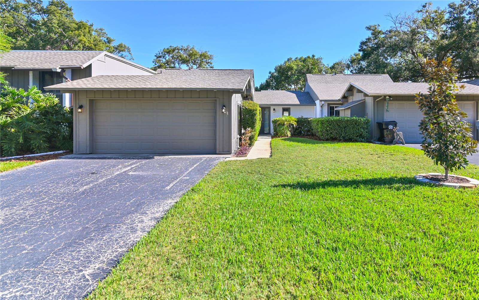 RARE OPPORTUNITY to own a single story duplex with attached 2 car GARAGE and A YARD in a TERRIFIC NEIGHBORHOOD.LOCATION! JUST OFF 441, TONS OF SHOPPING, DINING, GROCERY STORES! Terrific school zone too!!! Nestled within highly desired Errol Estates and surrounded by homes that sell at an average of 500-600k! Nicely remodeled, FLOOR TO CEILING, ALMOST EVERYTHING HAS BEEN REPLACED!! STUNNING WOOD BASED WATER PROOF FLOORING THROUGHOUT! Great views! All rooms are very generous in size! High vaulted ceilings and lots of natural light. KITCHEN REMODEL, Beautiful WOOD cabinetry, SOFT close doors, lazy susan, newer stainless appliances, remodeled baths, glass sliders replaced, popcorn ceilings removed! Immaculate and Move In Ready! The hoa maintains the lawn and exterior of the home. ROOF 2021, EXTERIOR PAINT 2023. RE-PLUMBED AND NEWER ELECTRICAL PANEL. Very close to shopping, dining and groceries! Apopka is an amazing location offering easy access to Orlando and theme parks yet a quality of life. List agent is Owner.