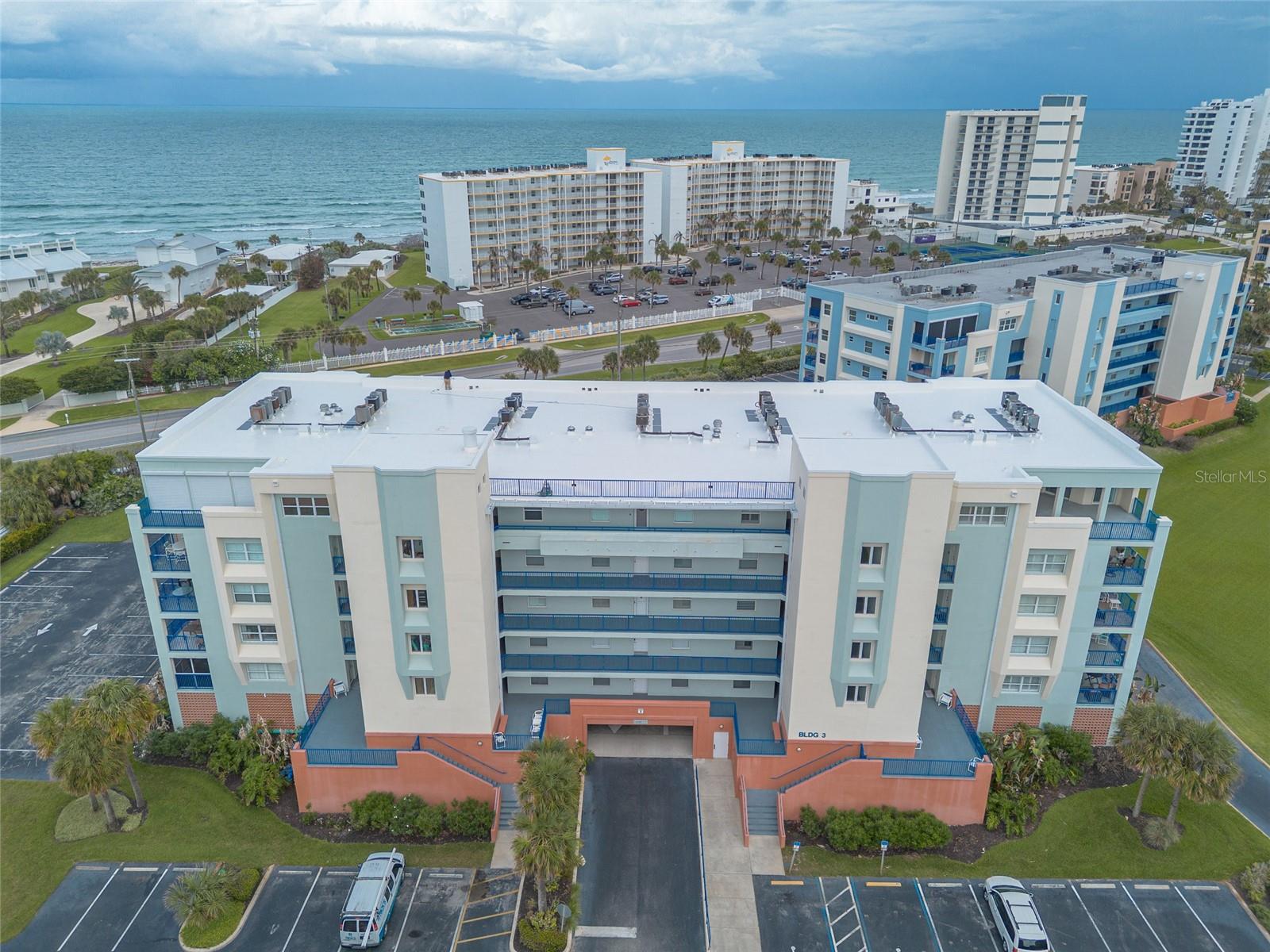 Own a 6th floor penthouse in Ocean Walk Condominiums and create the Florida lifestyle you have been looking for. This spacious 3-bedroom, 3.5-bath condo offers over 2,600 sq. ft. of living space, a large private terrace, and incredible sunset views. The open kitchen and living areas overlook the private terrace where you can view the stunning sunsets from every angle, giving the new owner a great foundation to reimagine the space indoors and outdoors and make it their own paradise.  The exceptionally large primary suite features a walk-in closet and spacious bath area with room for dual sinks, a soaking tub, and separate shower.  Each guest bedroom has its own bath giving privacy to family members and guests. This penthouse is a clean slate for a great remodel with its large size, layout, views and location, you can really create something special. Ocean Walk offers resort-style amenities including two clubhouses, multiple pools, fitness centers, tennis courts, basketball, shuffleboard, sauna, nature trail, and private beach access by pedestrian walkway. Conveniently located near the shops and restaurants on Flagler Avenue and Canal Street, this condo is ideal for a buyer wanting to create a luxurious coastal retreat. With gorgeous amenities, beach access, and nearby dining and entertainment, there is always plenty to do on and off the property. Bring your imagination and see the potential this penthouse has to offer.  This property is a Hud home – case # 094-574403.  Come see it and get your bid submitted today!  There are no warranties expressed or implied.  All measurements are approximate.  Sq. footage received from the tax rolls.  All information recorded in the MLS is intended to be accurate but cannot be guaranteed.  Buyers should check association rules and regulations for rental and pet restrictions.