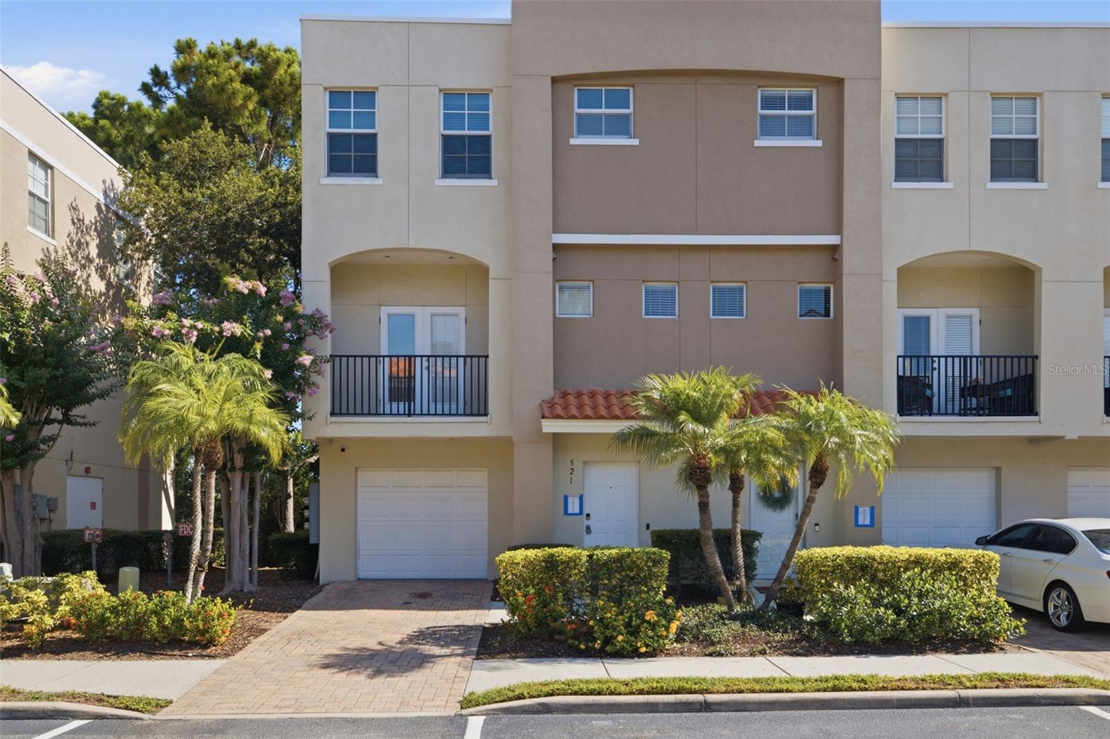 Welcome home to 521 101st Ave N — a beautifully updated 3-bedroom, 3.5-bath townhome tucked inside the gated Gandy Townhomes community in St. Petersburg. Spread across three thoughtfully designed levels, this 1,680 sq ft home blends style and low-maintenance Florida living.
The heart of the home is a fully updated kitchen featuring crisp white shaker cabinetry, granite countertops, a glass tile backsplash, and stainless steel Samsung appliances — including a French-door refrigerator — all set against clean tile flooring. The primary suite offers a true retreat, with an updated ensuite bath showcasing a shiplap accent wall, a marble-look vanity with a modern vessel sink, warm gold fixtures, and a statement round mirror. Each bedroom includes its own private ensuite bath, and plush carpet adds comfort and warmth throughout the sleeping quarters.
With an attached one-car garage equipped with an EV charger, a private balcony, and access to a sparkling community pool, this home checks every box for comfortable, secure, and modern living. The gated community offers peace of mind, while HOA-covered exterior maintenance, landscaping, water, sewer, and trash keep life simple. Ideally located near the 4th Street and Gandy Blvd corridors, you're just minutes from shopping, dining, downtown St. Petersburg, Tampa International Airport, and the Gulf beaches. Move-in ready and beautifully appointed — schedule your private showing today!