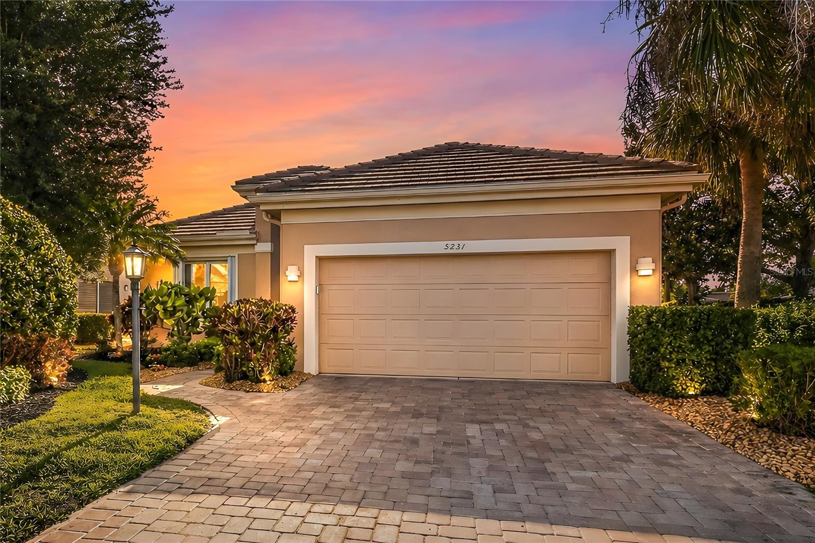 Welcome to this exceptional maintenance-free custom-built home located in the highly sought-after Rosedale Golf & Country Club. Pride of ownership is evident throughout this beautifully maintained 1,958 sq. ft. residence, featuring 2 bedrooms, 2 full baths, and a versatile den—perfect for a home office or guest space.
Designed with an open, light, and bright great room and dining floor plan, this home offers both comfort and functionality, ideal for everyday living and entertaining. Situated on an oversized, beautifully landscaped private corner lot, you’ll enjoy added space and privacy rarely found.
Step outside to your own private oasis, complete with a 30-foot pool with tranquil water feature, an extended lanai, and a paver brick patio—perfect for relaxing or hosting guests. The side-entry paver driveway enhances the home’s curb appeal.
This home is loaded with upgrades and thoughtful features, including a GENERAC natural gas whole-home generator, Miami-Dade approved hurricane shutters, and a home security system for peace of mind. Inside, you’ll find Closets by Design in the primary suite and laundry room, custom window treatments, and natural gas hookups in both the kitchen and laundry room.
Additional updates include a newer A/C system and a hot water heater just one year old and radiant barrier.
This is Florida living at its finest—low maintenance, beautifully upgraded, and located in one of Bradenton’s premier golf course communities. Don’t miss this opportunity! NO CDD FEES OR MANDATORY MEMBERSHIPS HERE!