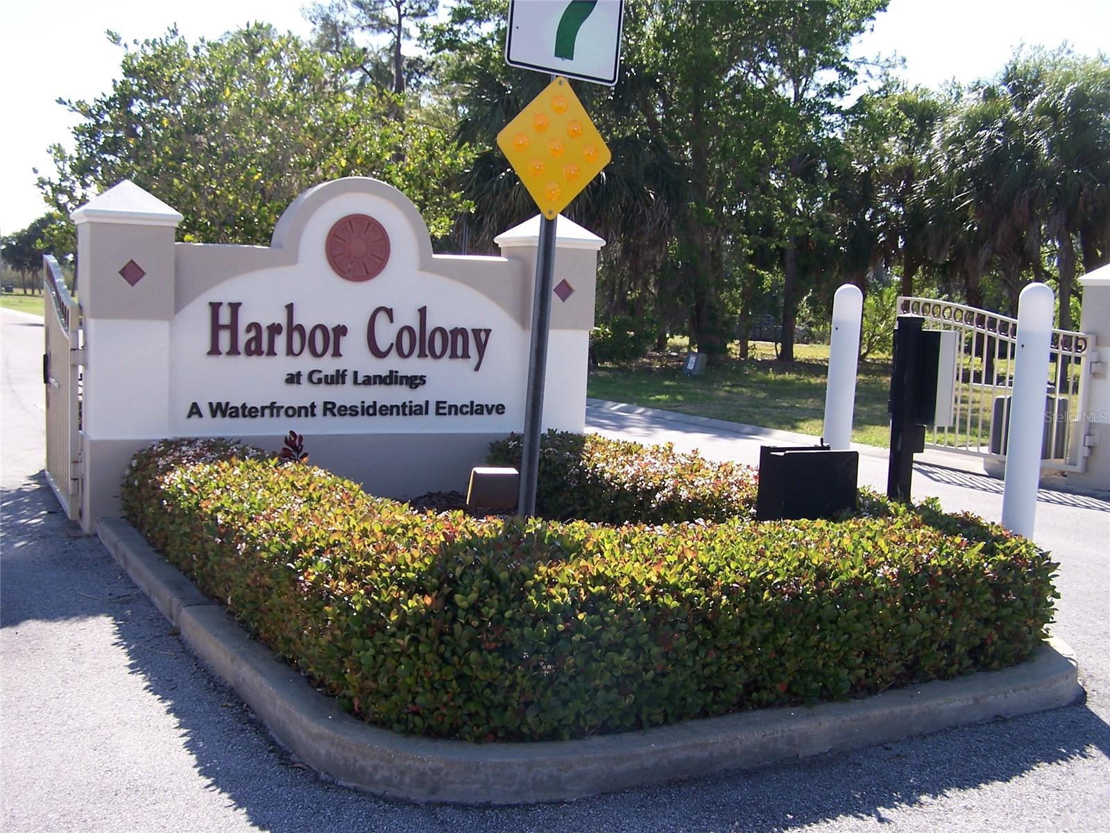 WIDEST FRONTAGE IN THE NEIGHBORHOOD BY FAR, SUITED FOR A LARGE HOME FOOTPRINT. DON'T SETTLE FOR A SHOEBOX LOOKING HOUSE THAT LOOKS LIKE A COLLEGE TOWNHOUSE. BUILD THE SIZE YOU WANT, WITH SOME CURB APPEAL! YOU WON'T FIND WHAT THIS LOT OFFERS AT THIS PRICE ELSEWHERE IN THE AREA. Enjoy the Florida saltwater lifestyle on this large lot sold with a truly-deep-water boat slip with ocean access even at low tides with a large, family-sized boat. Located in a newer, premiere, gated, manicured, waterfront community, with homes still being built, this lot has the widest street frontage, with approximately 110 feet at the curb, more than double the frontage of most others, offering a much wider house frontage for ideal appearance. It is one of only a few lots remaining in the neighborhood. Boat slip 14 comes with the sale and is located on Elizabethan just around the corner toward the south end of the docks. Buyer will also enjoy access to Gulf Harbor's private, gated Gulf-front beach club with maintained beach sand, volleyball court, pavilions, grills, marked swimming area, and beachside bathhouse. There is a yacht club in the neighborhood as well. Harbor Colony is convenient to all of one’s daily needs: shopping, nightlife, banking, a quaint downtown, islands, more beaches, Gulf-front entertainment and dining, professional sporting events, and all that Tampa Bay has to offer. All of this for a comparably low HOA fee in what may be one of the least expensive coastal areas in Florida, in a county recognized for its lower taxes and cost of living.