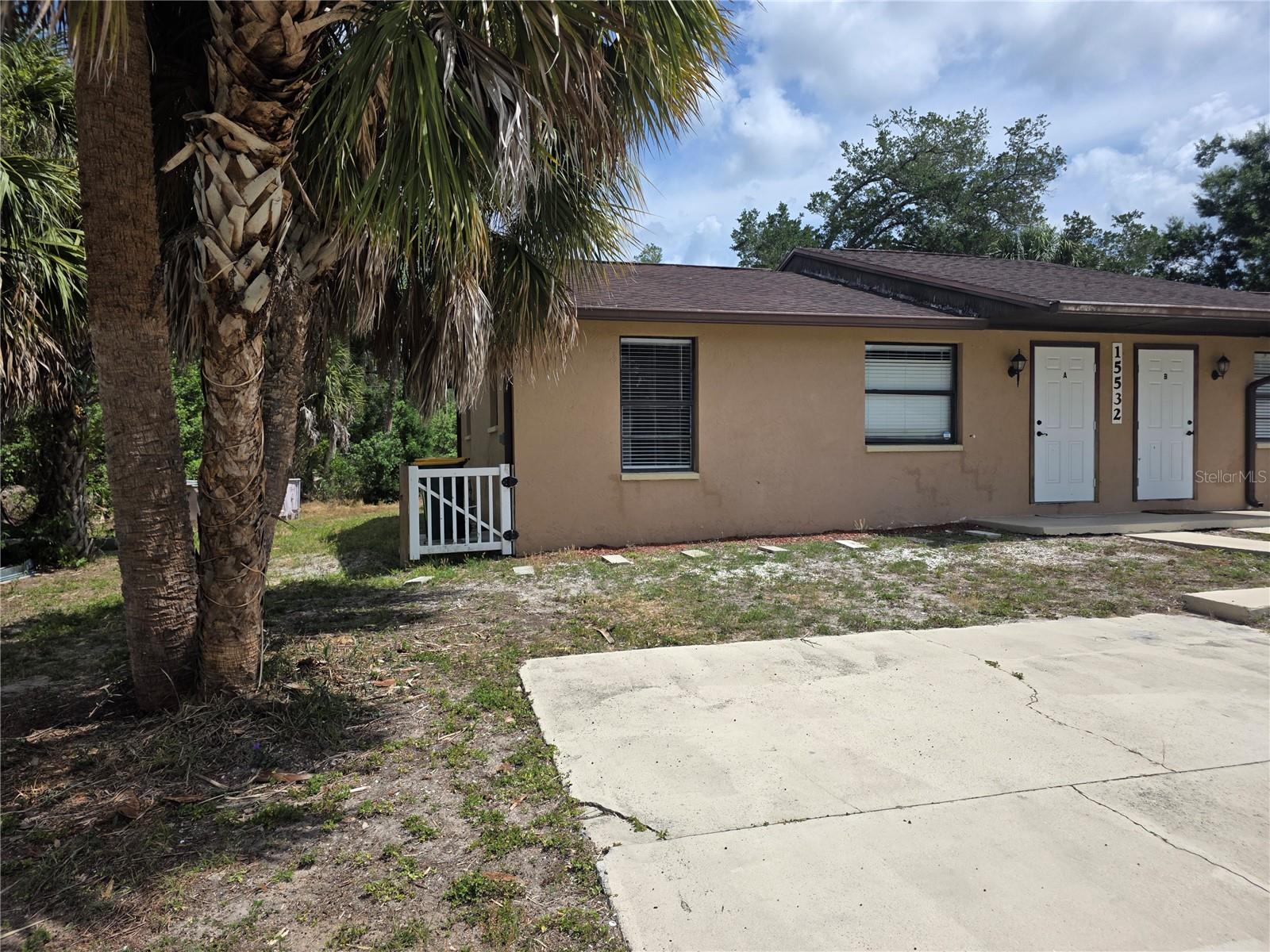 Welcome to this well-maintained two-bedroom, one-bath duplex offering comfortable living in a convenient location near the North Port and Port Charlotte border. The home features attractive porcelain tile throughout, rich mahogany-cherry kitchen cabinetry, granite countertops, and a functional layout with additional storage space. The bathroom includes a tiled tub surround and granite vanity top. Enjoy easy access to Cocoplum Village Shops, medical facilities, dining, everyday conveniences, and the beautiful beaches of Englewood. This rental offers a great combination of comfort, location, and value—schedule your showing today!