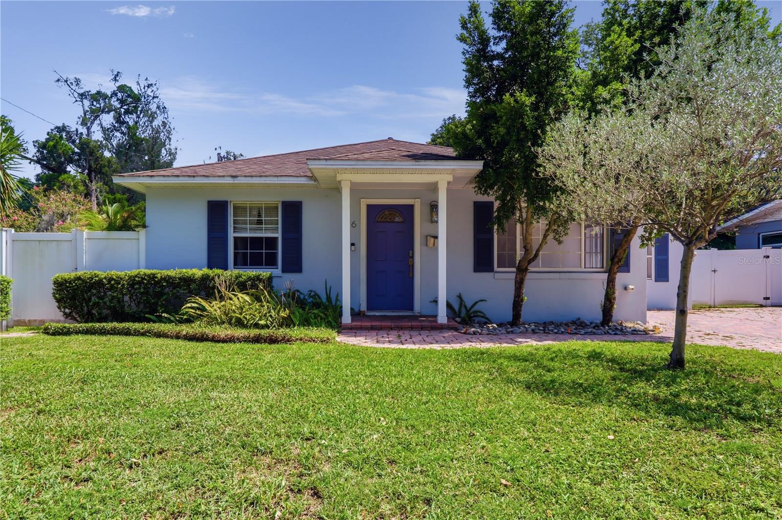 Virtually Staged. One or more photos have been virtually staged. 36 E Winter Park is an adorably well loved home in the heart of College Park in Orlando, and just a few blocks from AdventHealth Orlando. College Park is famous for its lifestyle - charming and classic architecture surrounded by delicious and local food! Opportunity to move into College Park has never looked better with 36 E Winter Park St! A beautifully renovated home updated in just 2021, the interior was totally refreshed with new flooring, paint, bathrooms, and new kitchen. Quartz kitchen counters, wood look tile throughout the home, and a relaxing screened in porch with ELECTRONIC screens to make your relaxation even easier in this slice of paradise. 

This home offers a flowing floor plan that stretches your eyes straight to the well loved rear yard, and also features a split bedroom plan separating the primary from the guest bedrooms. LOWER YOUR MONTHLY PAYMENT! The seller is also offering their assumable mortgage with a VERY desirable interest rate.