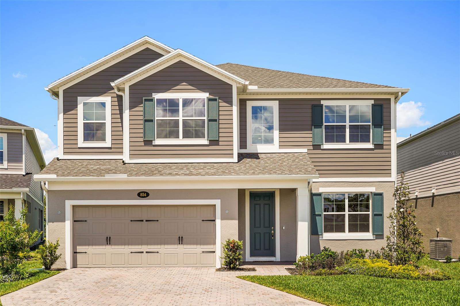 Welcome to the Estates at Rivercrest. From the moment you step inside, you’ll appreciate the thoughtful layout featuring dual owner’s suites on both the first and second floors—ideal for multigenerational living, long-term guests, or a private retreat. The private lanai and expansive back yard invites effortless indoor/outdoor living, while a versatile flex room provides the perfect space for a home office, playroom, gym, or media lounge.

At the heart of the home, the open concept design seamlessly connects the kitchen, dining and living areas, creating a welcoming space for everyday life and entertaining. The kitchen is a chef's dream, featuring high-end finishes, stainless steel appliances, double wall ovens, quartz counters, a cast iron farmers sink, ample storage space and a large center island that doubles as a breakfast bar. High ceilings and abundant natural light enhance the airy ambiance, while modern systems, designer finishes and premium fixtures elevate every detail. The owner's suite is a true oasis, boasting a spa-like ensuite bathroom with dual vanities, a soaking tub and a separate shower. 

Built with the quality craftsmanship and attention to detail M/I Homes is known for, this home combines timeless design with exceptional functionality. Upstairs, generously sized secondary bedrooms, one with ensuite bathroom, ensure comfort for family and guests alike, while the private upstairs owner’s suite offers a serene escape at the end of the day.

Situated in a vibrant community, this home offers convenience and accessibility to a range of amenities, including shopping centers, restaurants, parks and top rated schools. This is more than a home—it’s a lifestyle designed for comfort, connection, and effortless luxury.