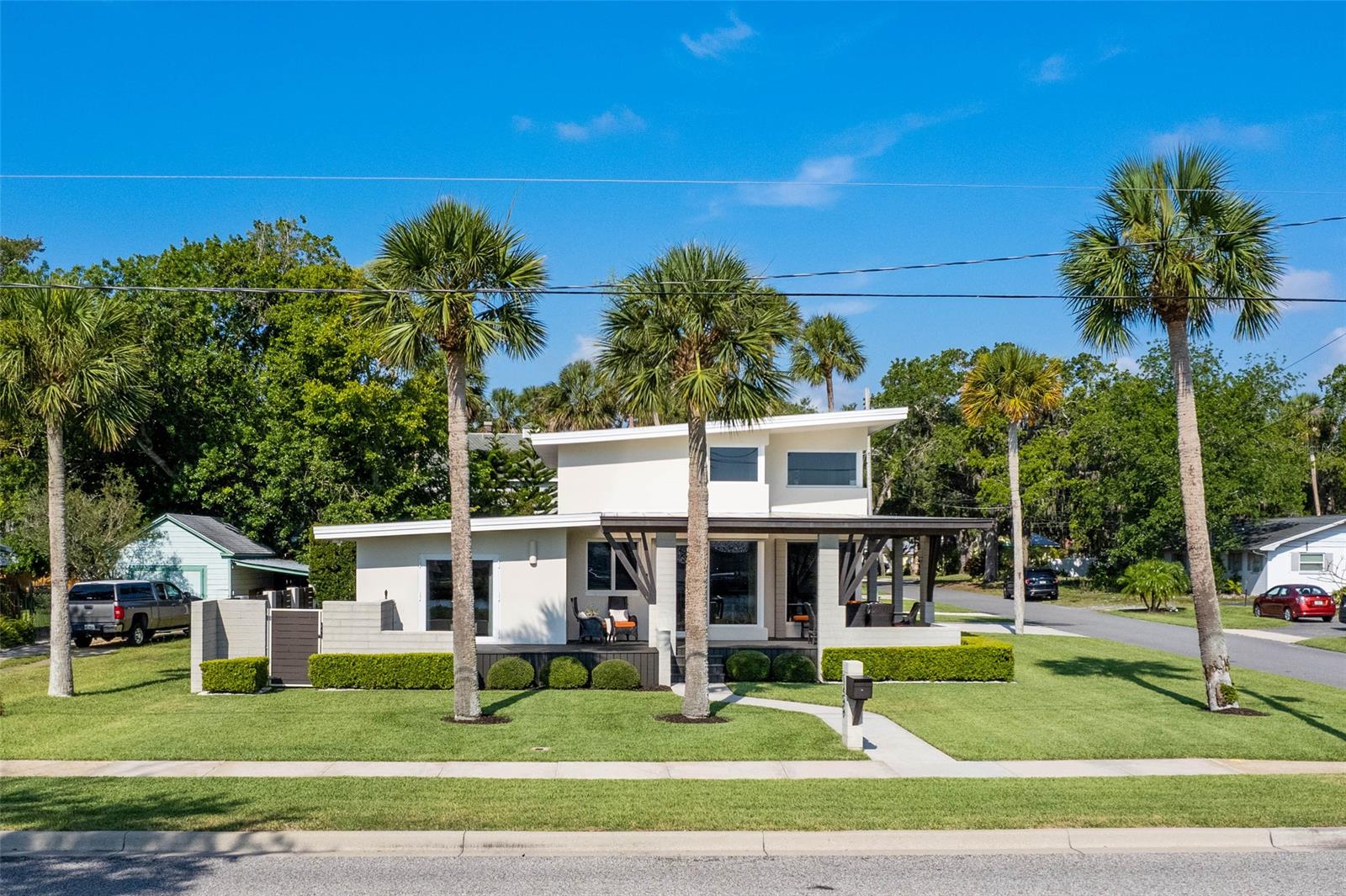 Welcome to your riverside paradise. This stunning new waterfront property offers the epitome of coastal living, with awe-inspiring views of the Intracoastal Waterway and access to the sparkling Atlantic Ocean just steps away. This 2 bedrooms, 2.5 bathrooms, and spacious 2-car garage has so many features. Open-concept living area with panoramic windows overlooking the water. Gourmet kitchen with top-of-the-line appliances, custom cabinetry, and a large island for culinary enthusiasts. Expansive master suite with private balcony, perfect for enjoying spectacular sunrises. Luxurious en-suite master bathroom with a deep soaking tub, walk-in shower, and dual vanities. Outdoor oasis featuring a large patio, ideal for entertaining guests or relaxing in the ocean breeze with a builtin bbq area and a spa-like pool with water and fire features. The private dock for fishing, boating, and enjoying the waterfront lifestyle. The lush landscaping surrounding the property creates a serene and tropical ambiance. Nestled in a prime location along the scenic Riverside Drive, this home provides convenient access to all the amenities and attractions New Smyrna Beach has to offer. Embrace the coastal lifestyle with nearby beach access, world-class surfing spots, and an array of waterfront dining options. Downtown New Smyrna Beach is just a short drive away, where you can explore charming boutiques, art galleries, and vibrant community events. Don't miss this rare opportunity to own your dream waterfront retreat. Schedule a private showing today and experience the magic of this property - where coastal living meets unparalleled luxury.