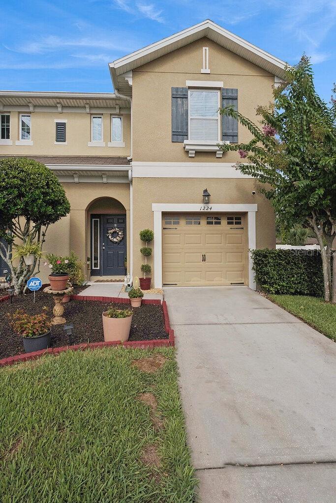 Welcome to 1224 Peterson Place in The Reserve at Hidden Lake, an intimate community of just 30 townhomes offering the perfect blend of comfort, convenience, and low-maintenance living. Ideally located near Lake Mary Boulevard and Sanford International Airport, with easy access to Downtown Orlando, Winter Park, major highways, shopping, dining, and entertainment.

Built in 2014, this move-in ready 3-bedroom, 2.5-bath townhome with a 1-car garage has been meticulously maintained and is ready for its next owner. The open-concept floor plan features tile flooring throughout the main living areas, a spacious kitchen with granite countertops, stainless steel appliances, abundant cabinetry, and generous prep space—perfect for everyday living and entertaining. All appliances are included, along with a newer washer and dryer and existing window blinds for added convenience.

Upstairs, you'll find beautiful wood stair treads leading to laminate flooring throughout the hallway and bedrooms, with tile in the bathrooms and laundry room for easy maintenance. The home has been continuously protected through HomeTeam Defense Pest Control, the HVAC ducts have been professionally cleaned, and the water heater is only six years old, providing added peace of mind.

Step outside to enjoy your private, vinyl-fenced backyard—a rare and desirable feature for townhome living, offering the perfect space for pets, grilling, gardening, or simply relaxing. Best of all, the HOA takes care of lawn maintenance, allowing you to enjoy a true low-maintenance lifestyle.

Located in the highly desirable Seminole County School District, this home offers exceptional value with a $10,000 buyer credit from the seller, plus up to a 1% lender credit when using one of the seller's preferred lenders. Don't miss this incredible opportunity to own a beautifully maintained townhome in one of Sanford's most convenient locations. Schedule your private showing today!