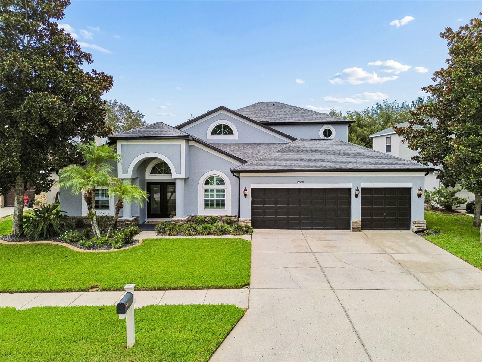 If you're searching for a move-in ready, exceptionally well-built, and meticulously maintained home with outstanding resort-style amenities in a prime location, your search ends here!!!
This impressive 6-bedroom, 4-bath home is located in the award-winning community of Wilderness Lake Preserve and offers countless major updates, including a newer roof, gutters, exterior paint, water heater, Energy Star vinyl windows, and sliding glass doors leading to the lanai. Complete with a beautiful private pool, this home is a truly exceptional alternative to new construction.
Step inside to discover an open foyer with soaring ceilings, formal dining room, and an open-concept floor plan designed for everyday living and effortless entertaining. The spacious family room flows seamlessly into the kitchen and breakfast nook, creating the perfect gathering space for family and friends.
The beautifully updated kitchen features rich wood cabinetry, stone countertops, stainless steel appliances, a reverse osmosis water filtration system, and a breakfast bar.
The thoughtfully designed split-bedroom floor plan offers generously sized bedrooms with ample closet space. The spacious primary suite is a true retreat, featuring private access to the pool, dual walk-in closets, a double-sink vanity, an oversized walk-in shower, and a relaxing soaking tub.
Upstairs, you'll find the sixth bedroom with its own full bath, along with a large loft that offers endless possibilities as a media room, game room, playroom, home gym, or additional living space.
Just a few homes away, (see photo 70 & 71) you'll enjoy easy access to the neighborhood fishing dock and picnic area, perfect for relaxing afternoons by the lake.
Residents of Wilderness Lake Preserve enjoy access to the spectacular Wilderness Lodge, featuring a lagoon-style pool, heated lap pool, outdoor hot tub, lakefront fitness center with saunas, large fishing dock, boats for lake access, tennis and pickleball courts, basketball and sand volleyball courts, a movie theater, nature center, playgrounds, parks, a three-story treehouse, activity center, party room, picnic areas, and a full calendar of community events and activities.
Conveniently located in one of the Tampa Bay area's awards winning communities, this home offers easy access to I-75, the Suncoast Parkway, Tampa Premium Outlets, The Shops at Wiregrass, multiple Publix locations, restaurants, medical facilities, pet services, and all the everyday conveniences you need. It is also zoned for highly regarded Land O' Lakes High School, an International Baccalaureate (IB) school located just across the street from the community.
Be sure to allow extra time for your showing so you can experience the Wilderness Lodge and all of the incredible community amenities. Once you do, you'll understand why so many families love calling Wilderness Lake Preserve home.
