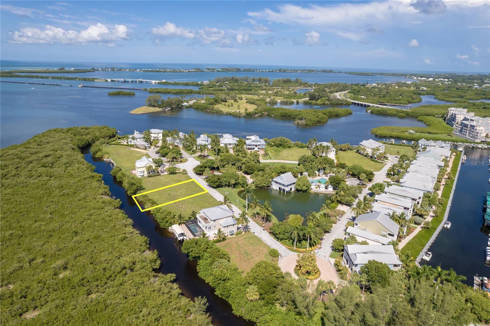 REDUCED!!  PRIME LOT IN EXCLUSIVE GATED COMMUNITY! Direct Access to the Intercoastal & Gulf of Mexico. If you're a boater, this is the perfect spot to build your dream home! Just 1 minute from the Intercoastal and a short ride to the Boca Grande Causeway and the Gulf of Mexico, this canal-front lot offers unbeatable convenience. Located in the prestigious, gated Anglers Club community, you'll enjoy southern exposure and breathtaking views of protected preservation land. This rare find is nestled among luxury homes and provides the ideal canvas to create your own waterfront masterpiece. Community amenities include a heated lagoon-style pool, clubhouse, fire pit, and a dock with water and electric for your boat. Several marinas are nearby, and you'll be just minutes from top-tier golf courses like the Tom Fazio Signature Coral Creek Club. Living here means easy access to pristine beaches like Boca Grande, Stump Pass, and Englewood. With endless opportunities for boating and fishing right at your doorstep, this is your chance to embrace the ultimate coastal lifestyle. Don’t miss this once-in-a-lifetime opportunity to own a piece of paradise!