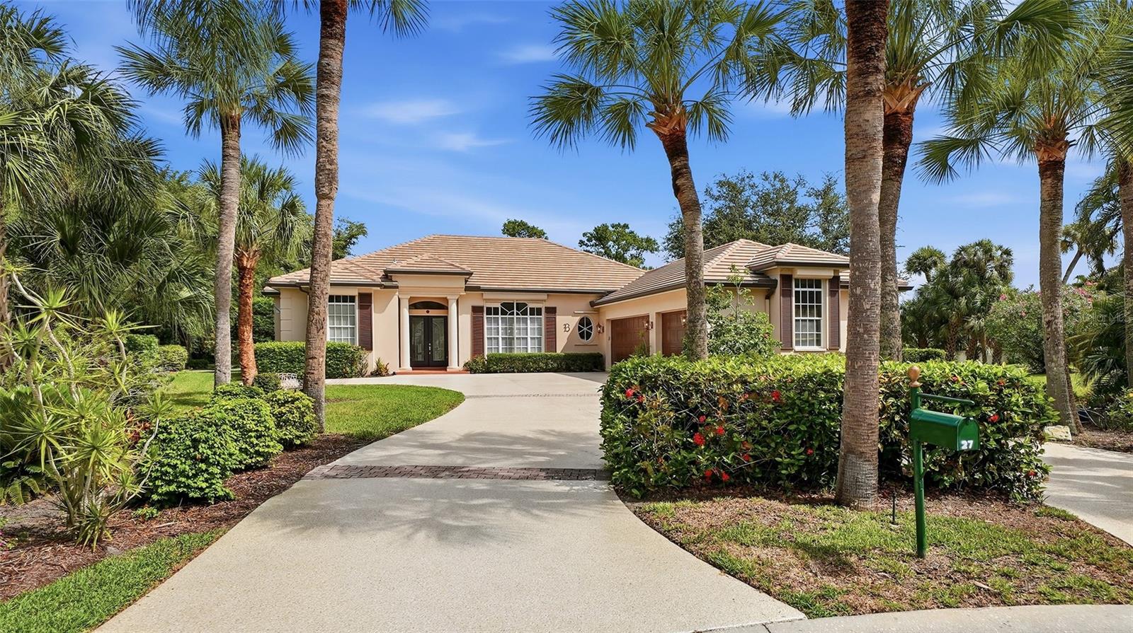 Experience elevated Florida living in this exquisitely appointed 4-bedroom, 3-bath estate residence with a 3-car garage, gracefully situated within the distinguished Boca Royale Golf & Country Club. Encompassing more than 3,300 square feet of air-conditioned living space, this exceptional home showcases generously proportioned interiors, sophisticated finishes, ceramic tile and engineered flooring throughout, a new roof in 2024, and hurricane shutters for all windows and doors. Designed with both elegance and functionality in mind, the gourmet kitchen features beautiful stone countertops, abundant custom cabinetry, expansive prep space, and newer appliances, creating an ideal setting for both everyday living and effortless entertaining. The luxurious primary suite serves as a private retreat, offering grand California-style walk-in closets, a dedicated dressing area, and a spa-inspired bath with garden tub, separate shower, and split double vanities. The fourth bedroom has been thoughtfully transformed into an elegant office or den with built-in cabinetry and desk, while the third bedroom is beautifully enhanced with high-end cabinetry and its own en-suite bath. Outdoor living is equally impressive, with a heated swimming pool, expansive covered lanai, and outdoor kitchen overlooking an oversized homesite of more than one-half acre. Included social membership provides access to the clubhouse, fine dining, tennis, pickleball, fitness center, and an active calendar of social events, while golf membership is available separately. Ideally positioned just minutes from Manasota Beach and Englewood Beach, and close to shopping, dining, and the arts, this remarkable property offers a rare blend of luxury, comfort, and coastal lifestyle.