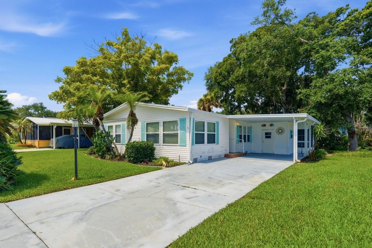 Welcome to Edgewater Landing, a sought-after 55+ active community in beautiful Edgewater, Florida! This charming 3 bedroom, 2 bath home offers comfortable living with a spacious layout designed for everyday convenience and easy Florida living. Enjoy a bright Florida room, perfect for relaxing with your morning coffee, reading, entertaining guests, or creating a hobby space. The home also features indoor laundry, a covered carport, and a storage room for added functionality.

Edgewater Landing is known for its welcoming lifestyle and impressive amenities, including a Pool, hot tub, clubhouse, fitness room, putting green/bocce court, pickle ball, game room, library/ceramic room, wood shop, community gathering spaces, and a fishing pier, with an additional boat launch/observation deck. Also includes walking trails. Boat/RV Storage is included. Whether you enjoy staying active, socializing with neighbors, spending time on the water, or simply relaxing in a friendly community atmosphere, this neighborhood has so much to offer.

Conveniently located near the Intracoastal Waterway, shopping, dining, medical facilities, and just a short drive to New Smyrna Beach, this home is a wonderful opportunity to enjoy the Florida lifestyle in a vibrant 55+ community.