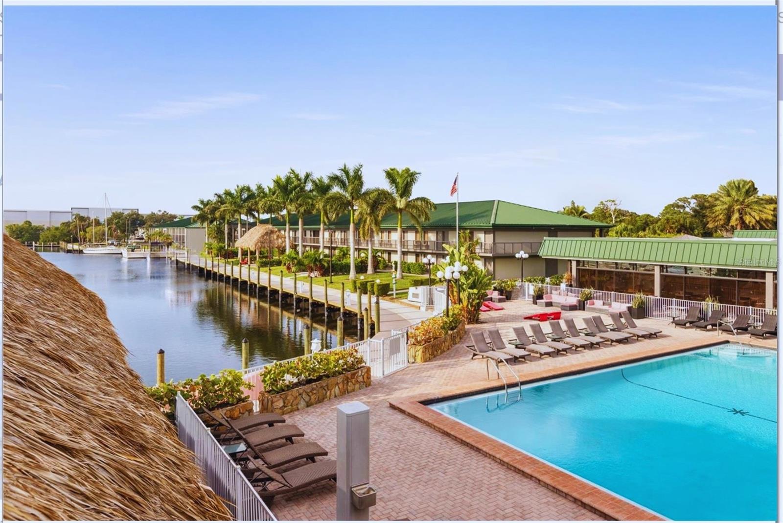 Best value in Sarasota Cay Club—waterfront resort condo, fully furnished with vacation rental flexibility and recently reduced to $95,000.

Ideal for a cost-effective Florida getaway or short-term rental use, this beautifully renovated 1-bedroom, 1-bath Studio unit is clean, updated, and turnkey. Features include 2 queen beds, 70" TV, workspace, microwave, coffee station, and an updated bathroom with walk-in shower and stone-top vanity. This is being sold furnished & turnkey.

Enjoy resort-style living by day with a heated bayfront pool, marina access, waterfront restaurant and tiki bar, fitness center, game room, and walking paths. Mornings and evenings are best spent relaxing in your beautifully renovated, tastefully decorated private retreat.

HOA includes all utilities—electric, water, sewer, cable, internet, phone, trash—plus exterior and common area maintenance, management, pest control, and access to resort amenities, making ownership simple and predictable. On-site management available for bookings, cleaning, and maintenance.

Prime Sarasota location just minutes to SRQ airport, downtown, and beaches including Siesta Key, Lido Key, and Longboat Key.

Hotel-condo use only: not permitted for full-time residence or long-term leasing.