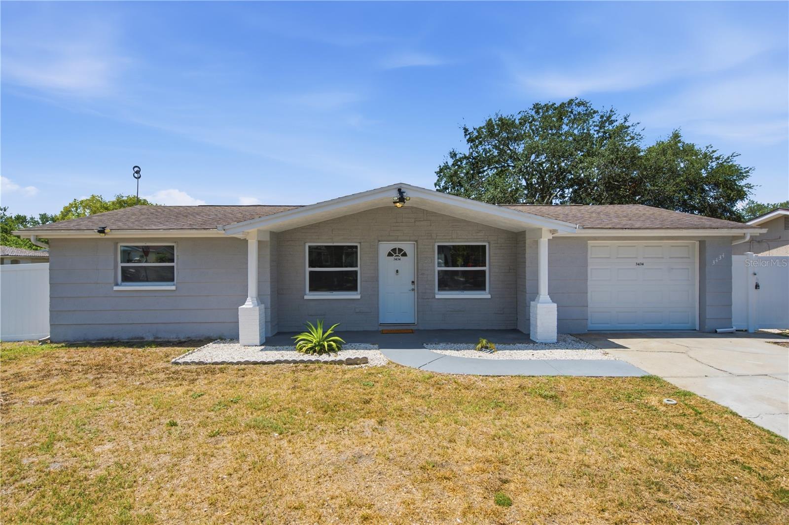 **Welcome to this beautifully FULLY REMODELED, move-in ready home in the heart of Holiday! Every detail has been thoughtfully updated with today’s modern finishes, including a stunning kitchen featuring quartz countertops, stylish cabinetry, stainless steel appliances, renovated bathrooms, updated flooring, new lighting, doors, trim, and fresh interior and exterior paint. Major upgrades provide peace of mind, including a NEW ROOF (2020), NEW WATER HEATER (2020), NEW A/C (2021), and a NEW PVC PRIVACY FENCE. The bright, open layout is perfect for everyday living and entertaining, while the spacious backyard offers plenty of room to relax, play, or create your own outdoor oasis. Conveniently located just minutes from the Gulf beaches, Anclote River Park, Fred Howard Park, Tarpon Springs Sponge Docks, shopping, dining, medical facilities, and major highways for an easy commute to Tampa. NO HOA. Whether you’re looking for your first home, a vacation property, or an excellent investment opportunity, this home is truly move-in ready and offers exceptional value. Schedule your private showing today!