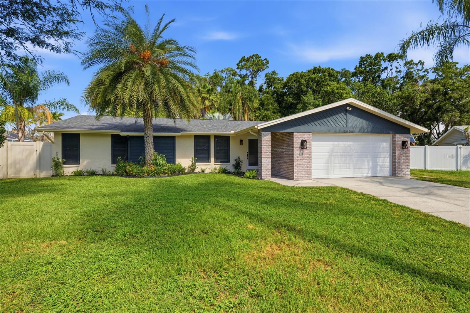 Welcome to this beautifully renovated Carrollwood pool home, perfectly situated on a quiet cul-de-sac and nestled on an oversized 0.35-acre fenced lot. Completely updated in 2023, this move-in-ready property offers the perfect blend of modern finishes and outdoor living. Inside, you'll find 3 bedrooms, 2 bathrooms, an office, and a spacious 2-car garage. The extensive 2023 renovation included a stunning new kitchen, fully remodeled bathrooms, new tile flooring throughout, fresh interior paint, and numerous additional upgrades that give the home a fresh, contemporary feel. Step outside to your private backyard retreat featuring a sparkling saltwater pool enclosed by a screen cage, providing year-round enjoyment. The expansive yard offers plenty of space for entertaining, gardening, pets, or play. A charming chicken coop is already in place - and the chickens can even stay with the property for buyers looking to enjoy a little homestead lifestyle. Major system updates provide peace of mind, including a 2019 roof, 2020 HVAC system, and a brand-new water heater installed in 2025. With its desirable Carrollwood location, extensive renovations, oversized lot, and resort-style outdoor space, this home is a rare opportunity you won't want to miss. ** Up to $5,000 towards closing costs with preferred lender **