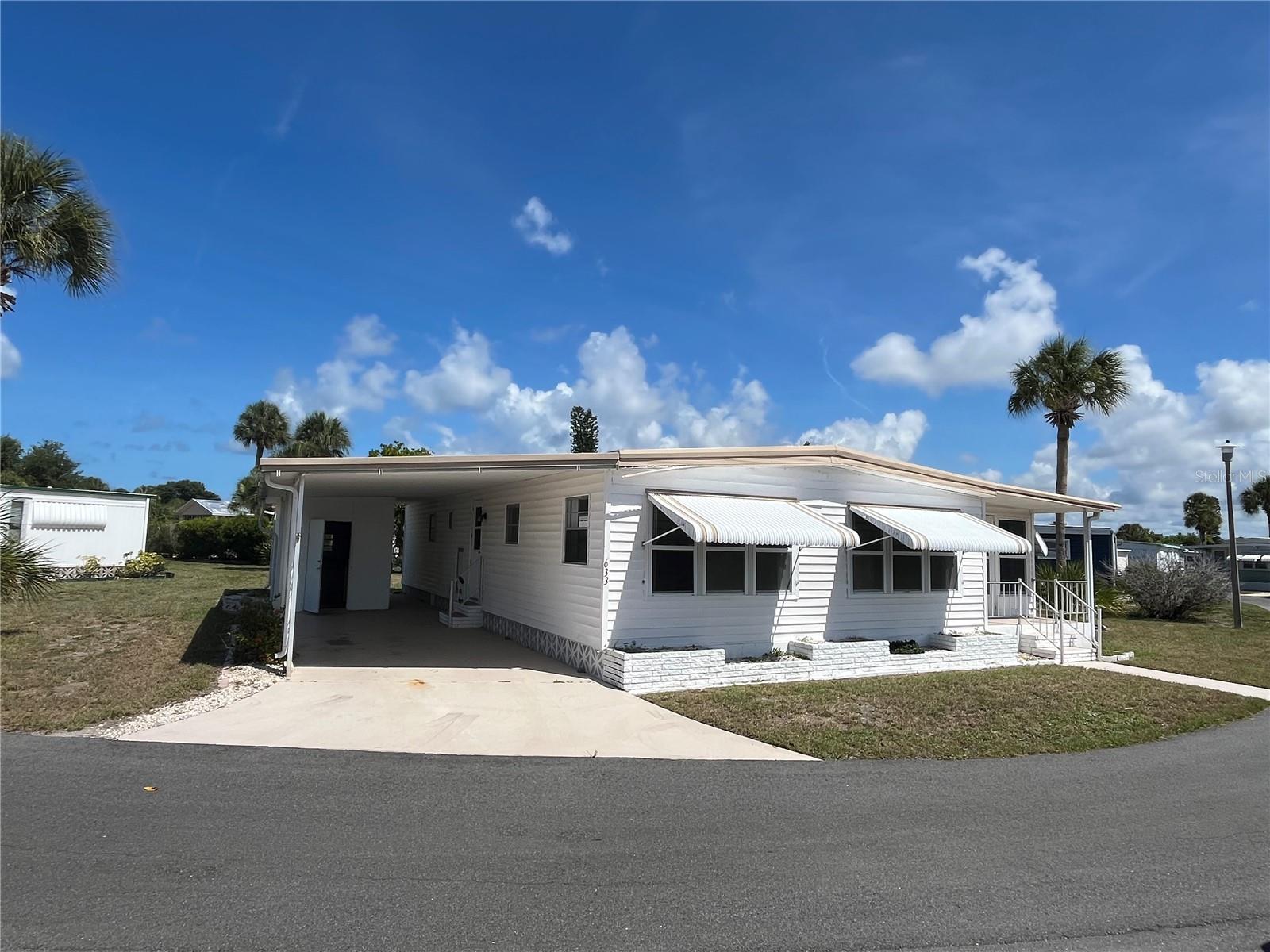 Laminate flooring in the Kitchen, dining room and living room. Windows have been replaced from original ones, Loads of closet storage, Flat aluminum coil roof over, this is a large home with an added bonus Florida room. A large lot with space between the other neighbors  homes.
Venice Isle is the premier resident owned over 55 Mobile home Park in Venice.  There are close to 1000 homes with the most active residents. There is always something going on for you to do. We have many Park gatherings and first rate shows on site. The Park has every amenity you can imagine. Come take a walk through both of our 2 clubhouses and make yourself at home. The Park has 2 tennis courts, a fitness center, 2 heated pools, 2 hot tubs, saunas, putting greens, shuffleboard, Bocce ball, miniature golf, art rooms, pool room, TV lounges, card rooms, library, horseshoes, ceramic kilns, 2 huge ballrooms, Sunday services and much more!