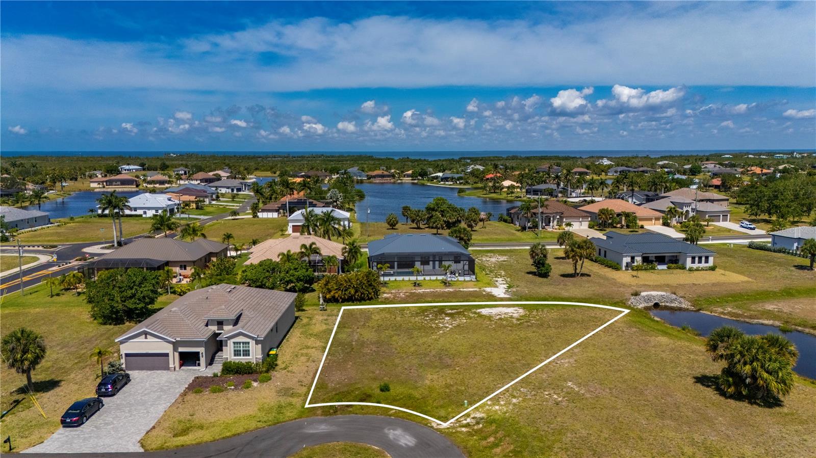 Build your dream home on this oversized, cleared vacant lot nestled in the highly sought-after Burnt Store Lakes community. Situated on a quiet cul-de-sac, this buildable parcel offers both privacy and a serene setting surrounded by scenic lakes and natural beauty. Enjoy the convenience of public utilities and the peace of mind of a well-maintained Property Owners Association. This prime location places you just 15 minutes from downtown and the airport, while also being close to Burnt Store Marina, offering easy access to Gulf waters for boating, fishing, and waterfront dining. Whether you’re ready to build now or invest for the future, this exceptional homesite combines tranquility, convenience, and coastal lifestyle appeal.
