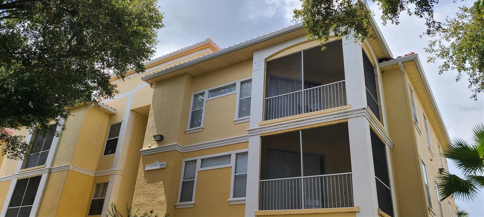 Welcome home to this beautifully updated and maintained 2-bedroom, 2-bath corner unit condo at Visconti West in Maitland! Located on the third floor, this light filled home features vaulted ceilings and an open, airy floor plan designed for comfortable living. The spacious primary suite includes an en-suite bathroom, while both bedrooms offer generous walk-in closets. The kitchen and bathrooms feature upgraded granite countertops and luxury vinyl plank flooring throughout the entryway, kitchen and bathrooms. Enjoy your morning coffee or unwind in the evening on the screened balcony. Additional highlights include an in-unit laundry room with washer and dryer, AC unit (2023), and hot water heater (2025). Residents enjoy gated access and resort style amenities including a pool, fitness center, clubhouse, tennis court, basketball court, valet trash pickup Monday through Friday, and a scenic pond and lake. Conveniently located just minutes from I-4, shopping, dining and entertainment, this home offers the perfect blend of style, comfort, and an unbeatable location.