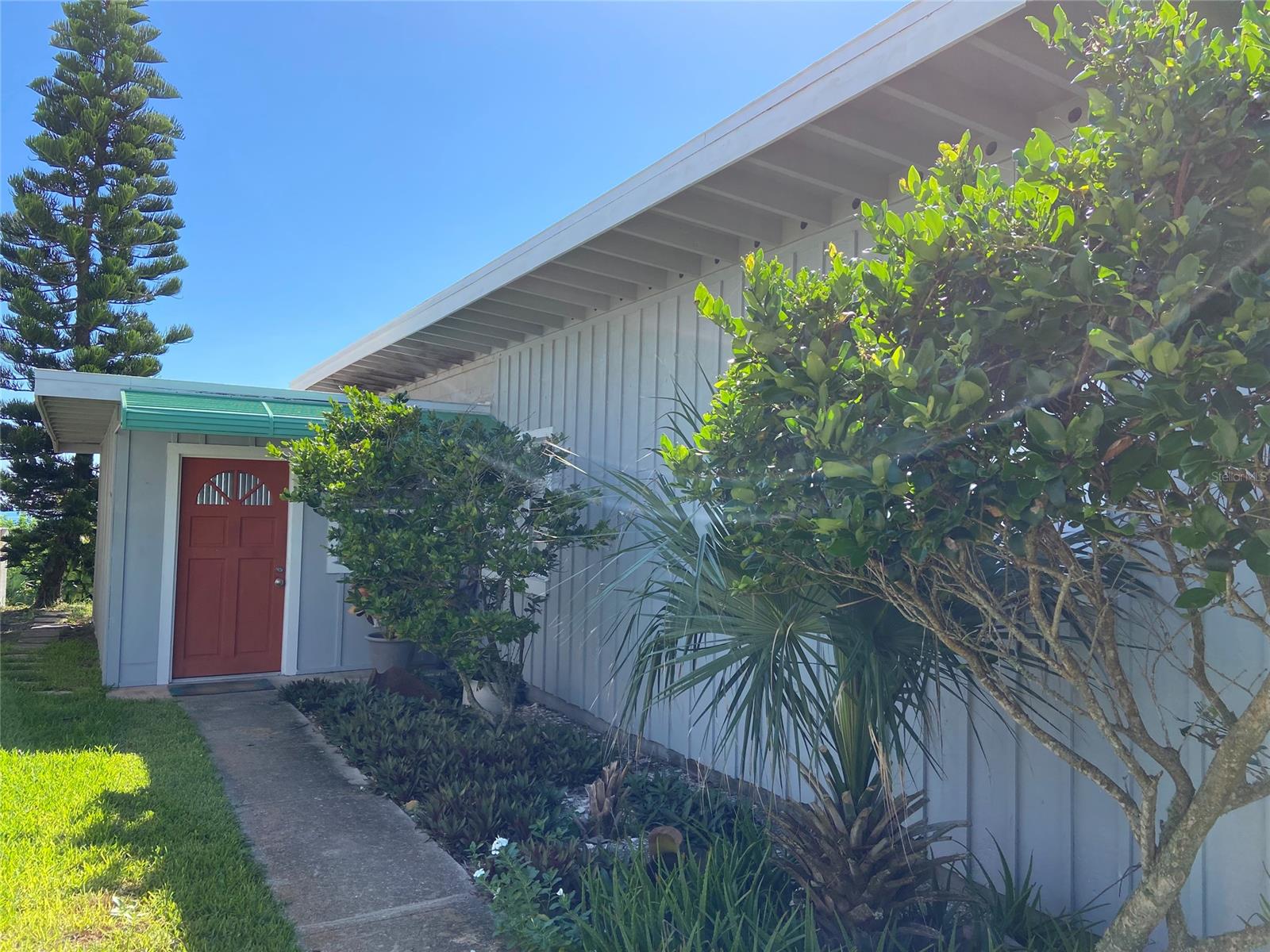 DIRECT OCEANFRONT BEACH HOME! 3 bedroom, 2 bath block home on high lot with burm of trees in the back and a path to the ocean, detached garage/storage.  Screened porch and deck set high on lot for panoramic views from your own backyard. ;Water: City