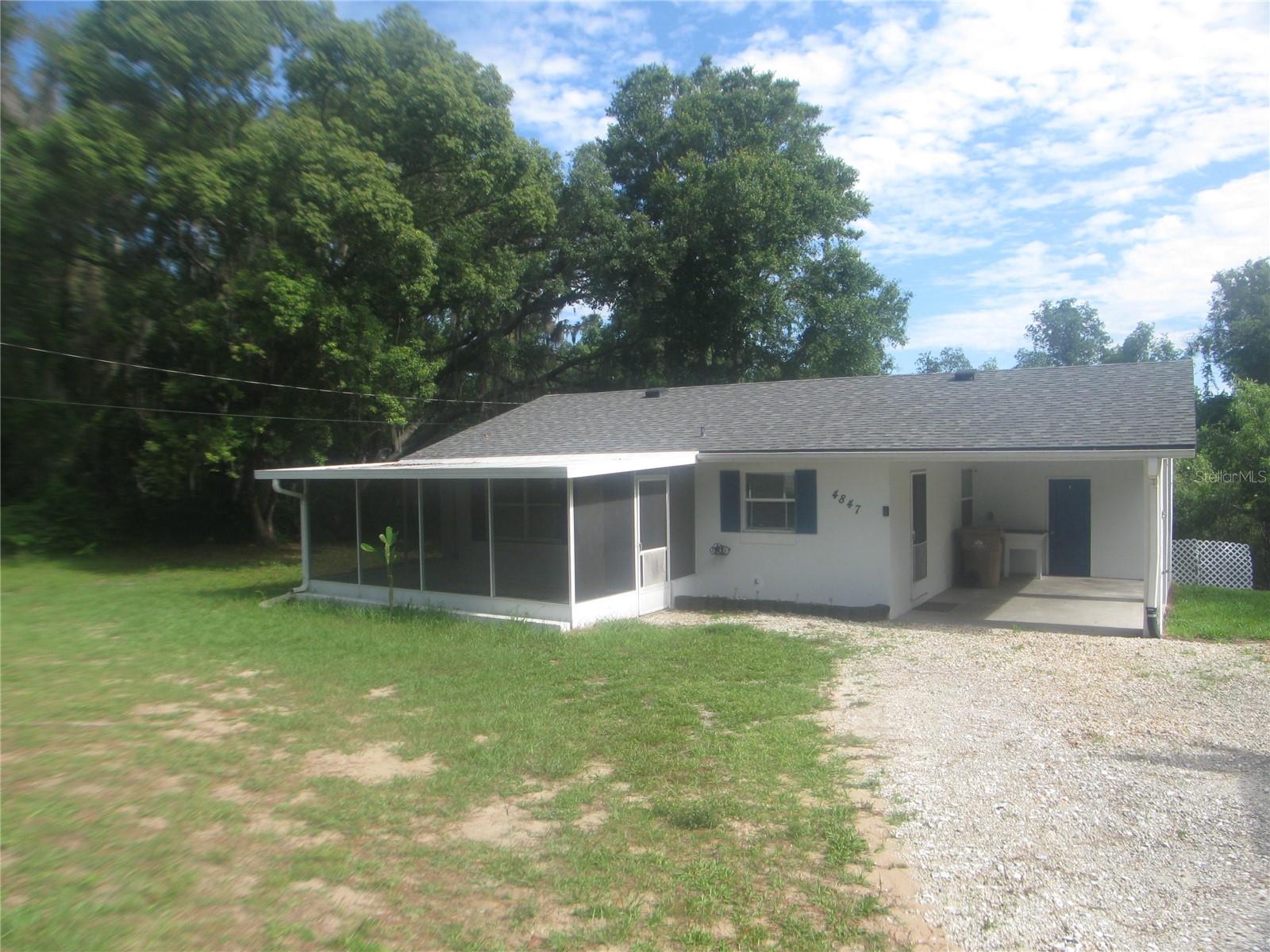 Can you say Privacy? This cute little home is away from the hustle and bustle yet a short drive to everything. Restaurants, shopping, major highways and hospital. The home is surrounded with a wooded lot for extra privacy. The kitchen is open concept to the living area. There is a firepit on the side yard for family cookouts. The large front porch is screened in to relax at the end of a long day. This is a must see!!