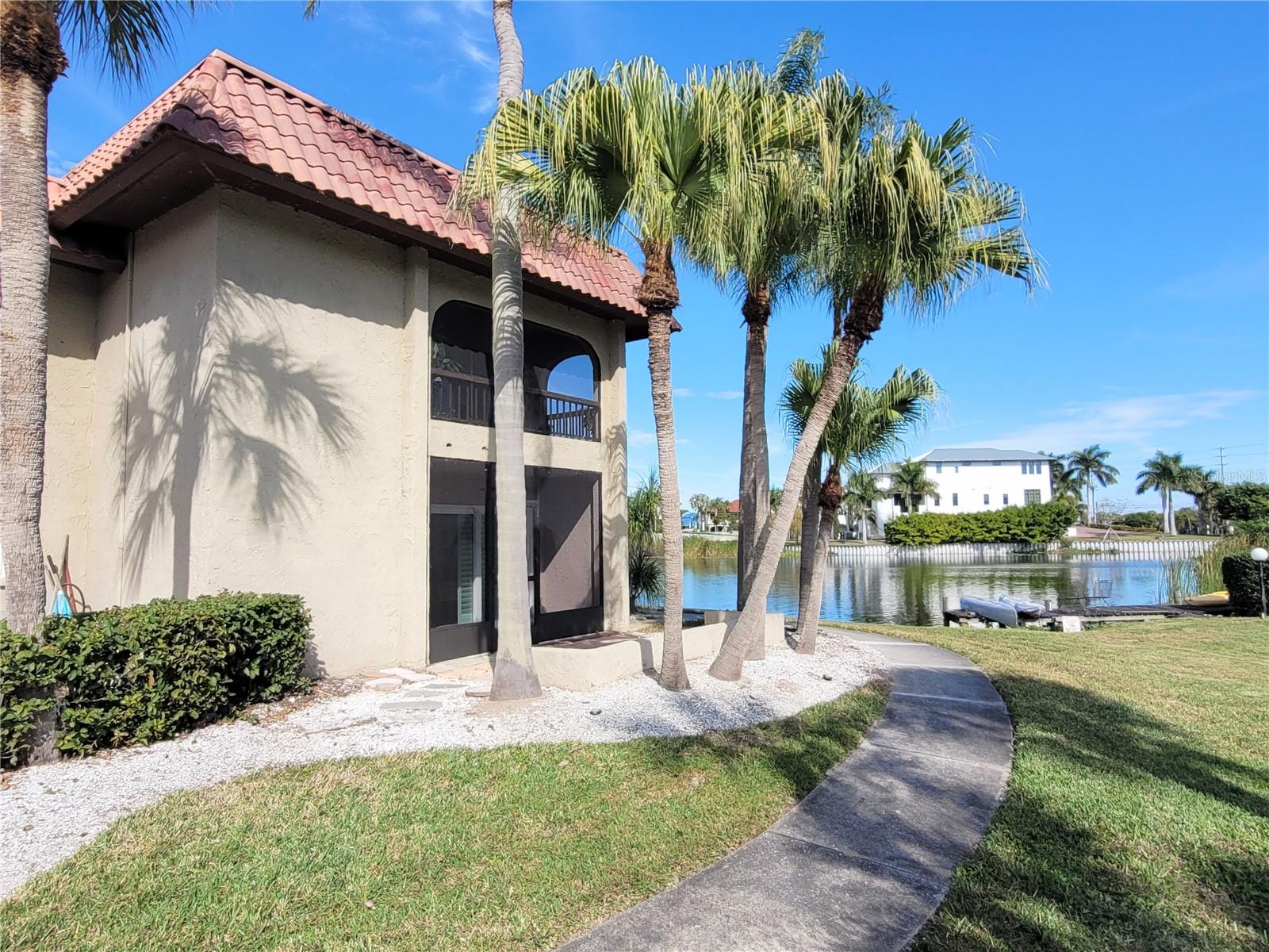 Fabulous first floor end unit on direct waterfront. Enjoy the completed updated and remodeled condo that comes fully furnished! A large kitchen and oversized family room make for comfortable living in this well appointed 1 bed/1 bath unit with wall to wall luxury vinyl plank flooring, a gourmet kitchen complete with stainless appliances, shaker cabinetry and solid surface counters with custom backsplash and upgraded hardware. Newer light fixtures and ceiling fans throughout. A washer/dryer combination unit conveys as well. This unit has been meticulously maintained by the owner and is ready for immediate occupancy. Make an appointment today!